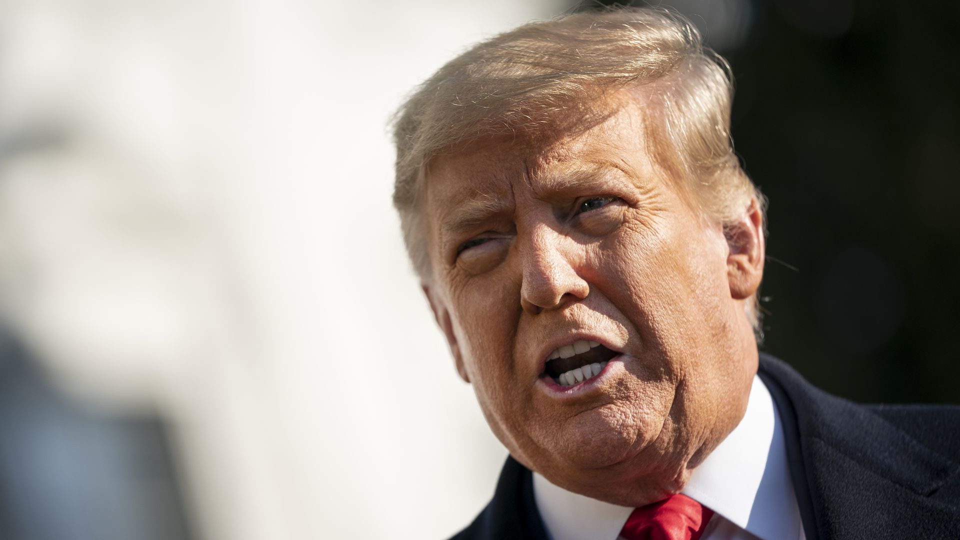  President Donald Trump speaks to reporters on the South Lawn of the White House before boarding Marine One on January 12, 2021 in Washington, DC