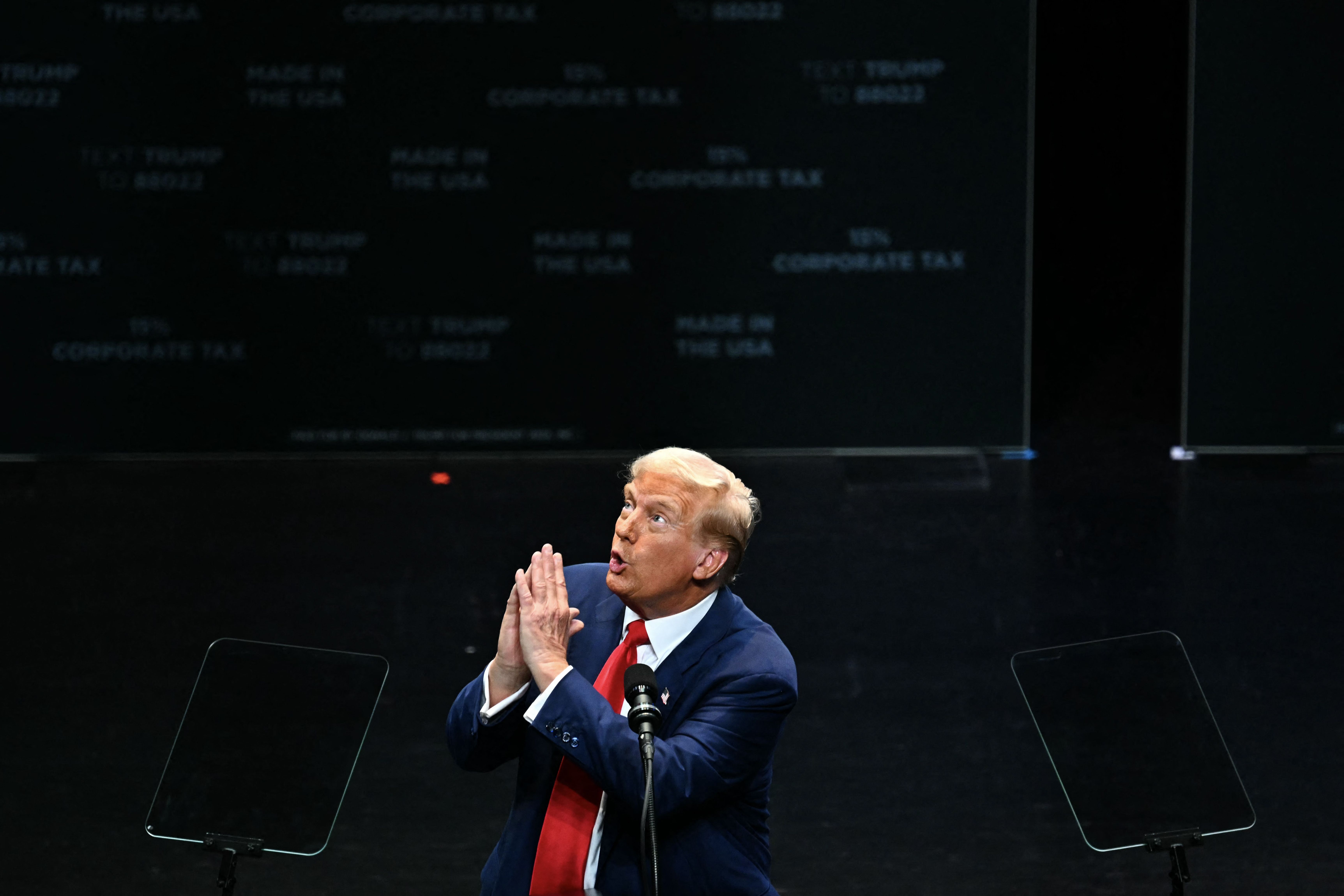 Former President Trump gestures while speaking during a rally in Savannah, Ga.