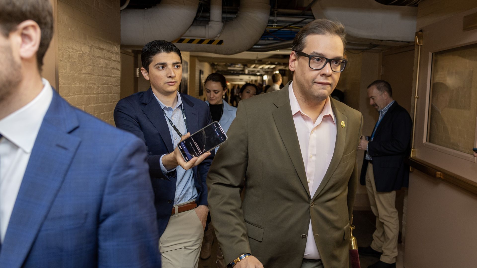 George Santos (R-NY) is followed by members of the media as he walks in the U.S. Capitol on April 26