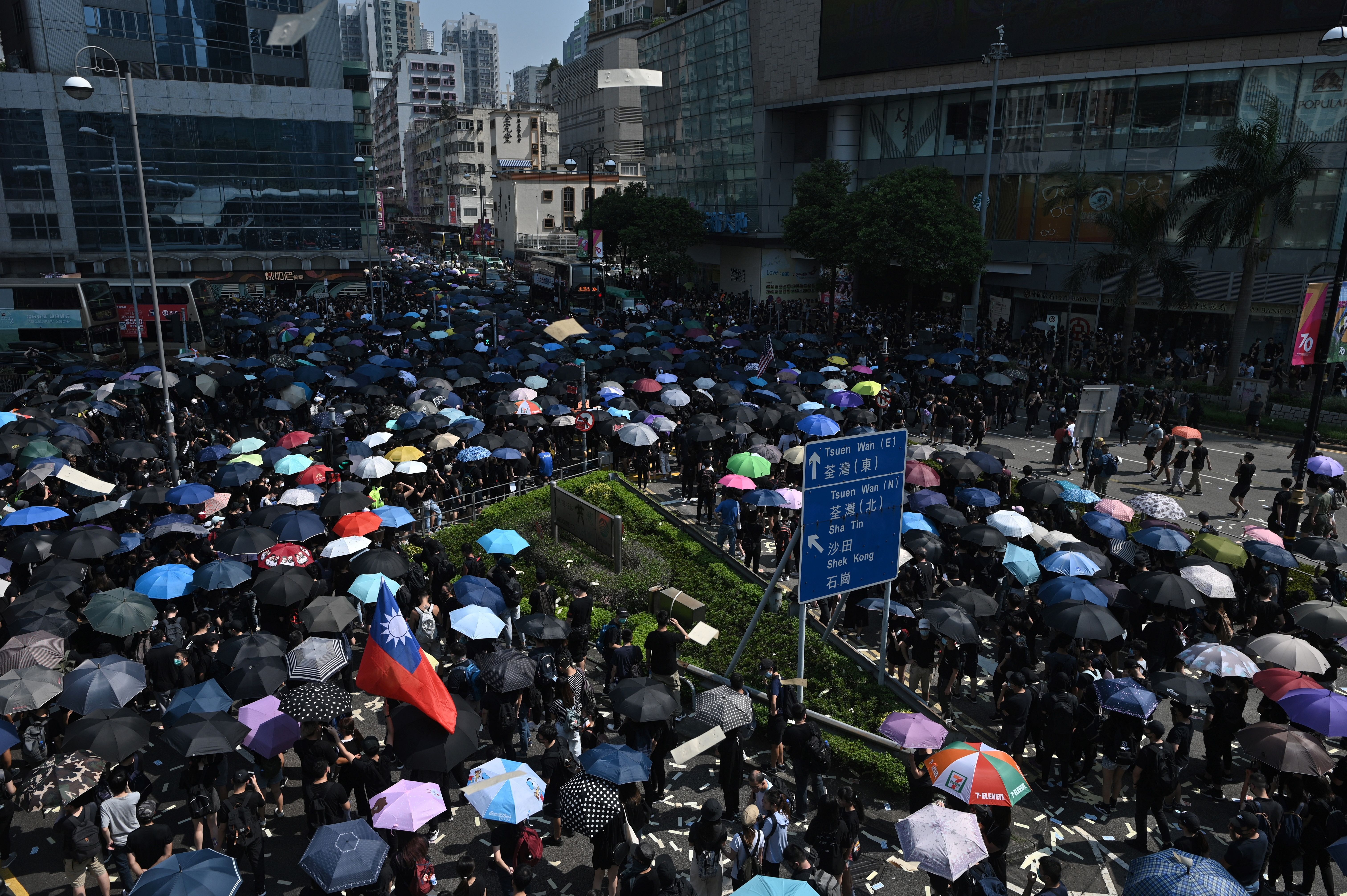 People attend a march in Tsuen Wan district in Hong Kong