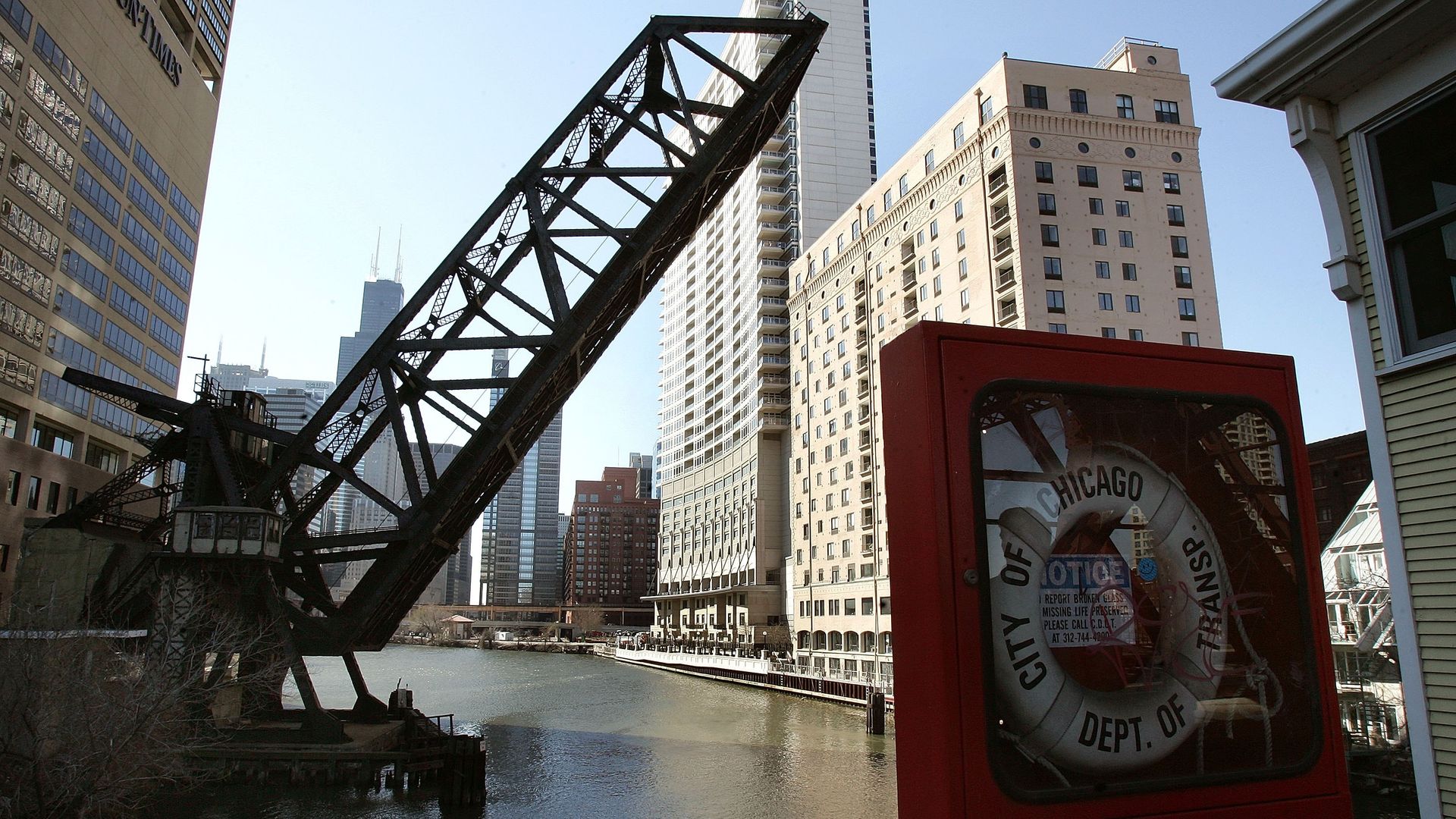 Photo of a bridge in front of high-rise buildings 