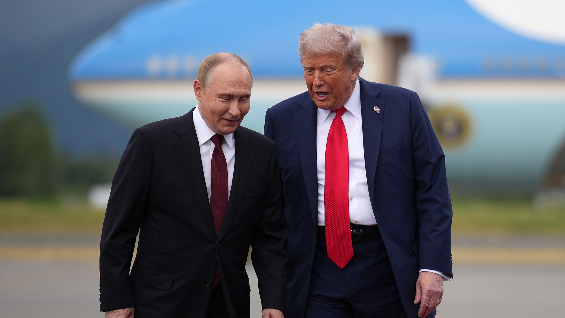 President Trump walks with Russian President Vladimir Putin at Joint Base Elmendorf-Richardson on Aug. 15, 2025, in Anchorage, Alaska.