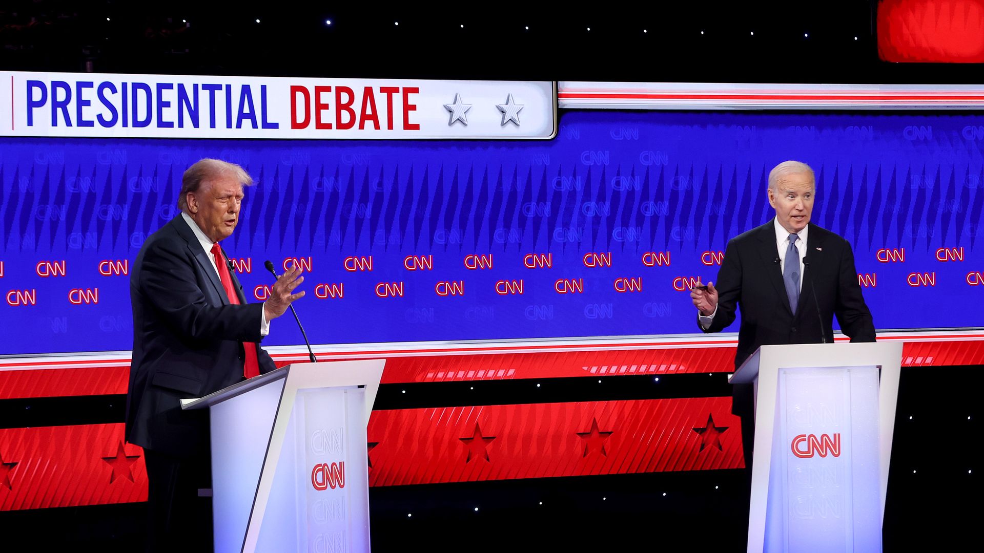 U.S. President Joe Biden (R) and Republican presidential candidate, former U.S. President Donald Trump participate in the CNN Presidential Debate at the CNN Studios on June 27, 2024 in Atlanta, Georgia.