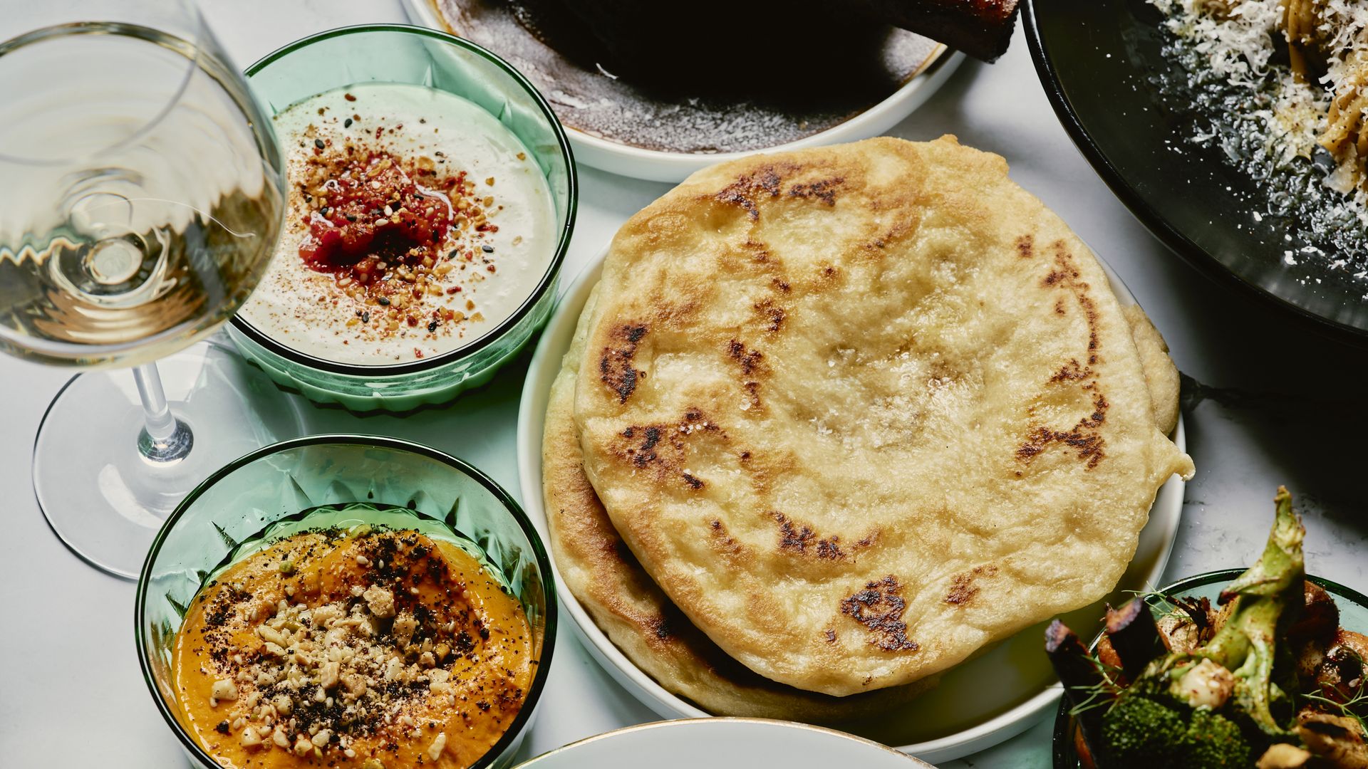 table with multiple food dishes displayed