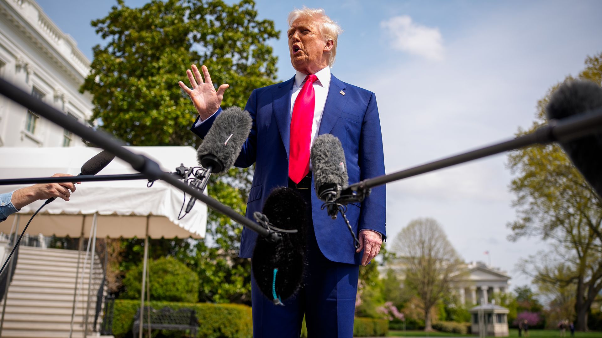 President Donald Trump speaks to members of the media before boarding Marine One on the South Lawn of the White House on April 3, 2025 in Washington, DC. 