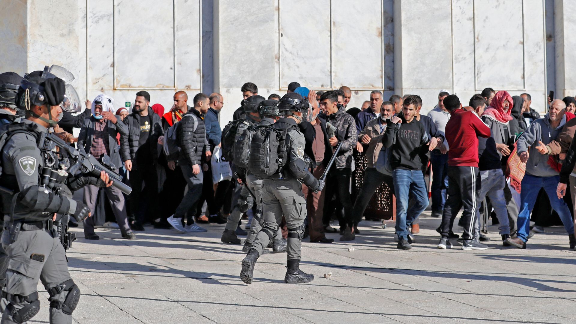Palestinians and Israeli police inside the al-Aqsa Mosque Compound.
