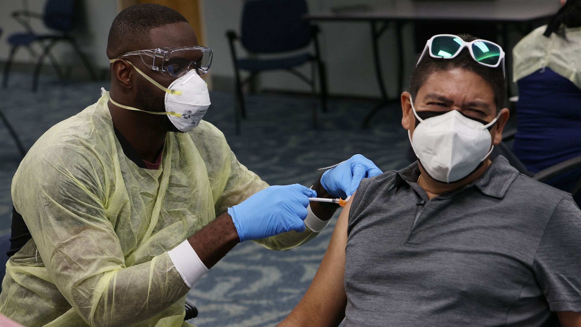 Picture of a man getting vaccinated