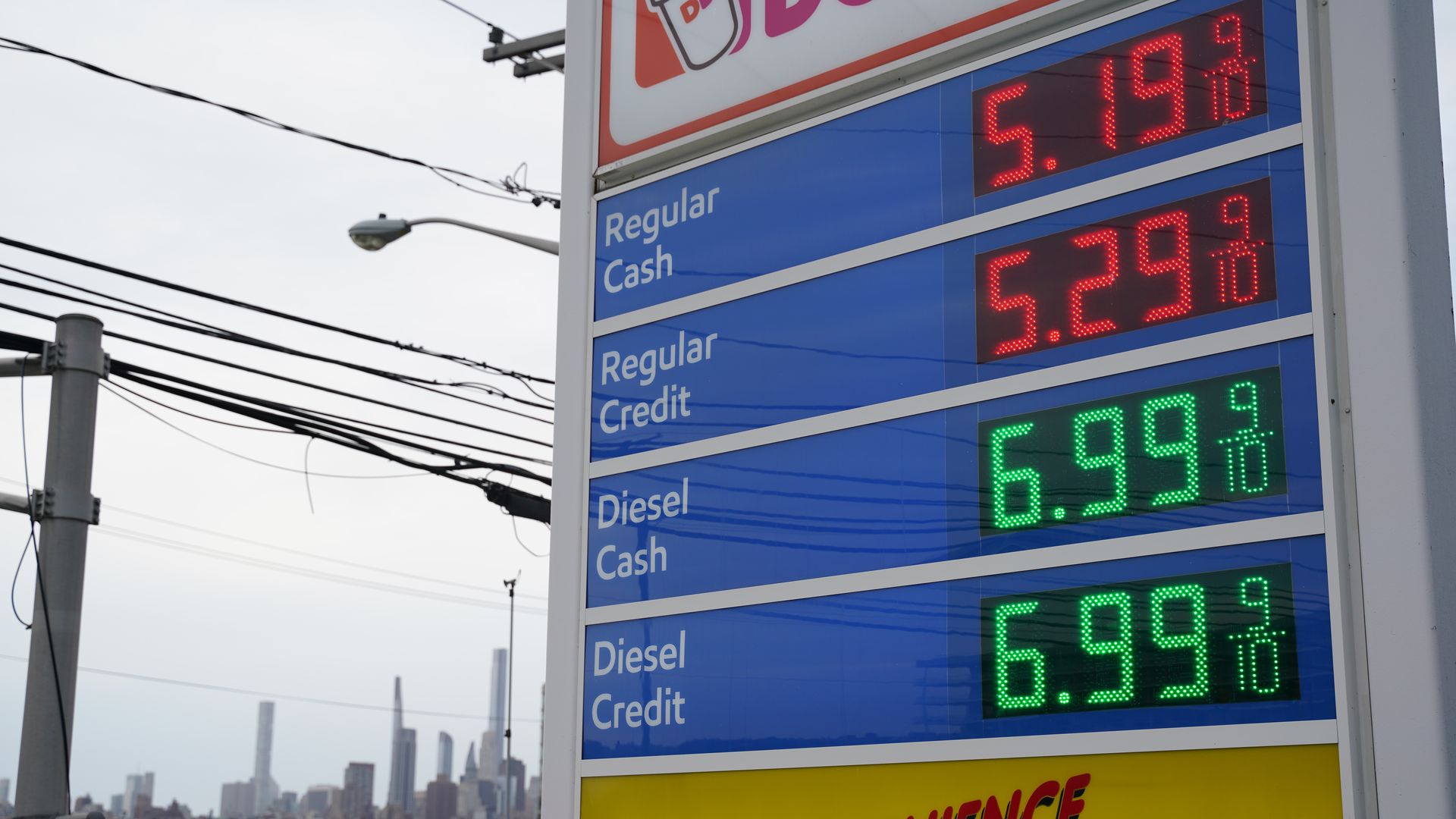 Gas prices over $5.00 a gallon are displayed at gas station