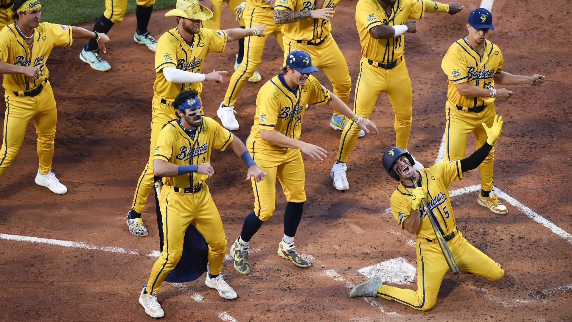 Savannah Bananas dance around home plate.