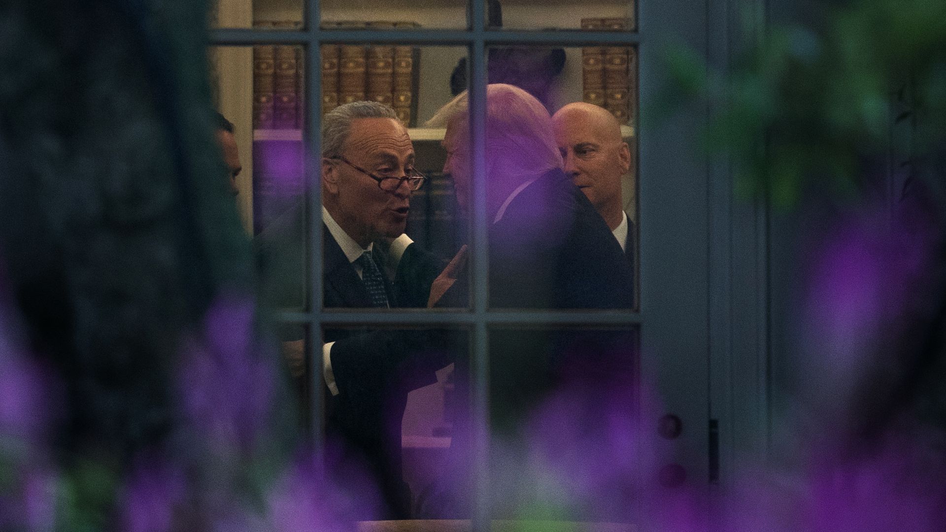 Schumer and Trump through the Oval Office window