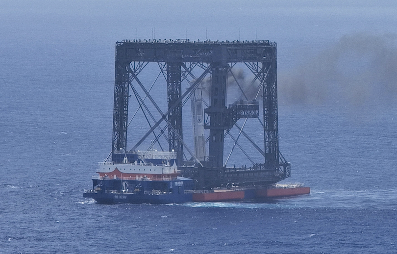 his drone photo taken on July 10, 2026 shows the successful capture of the returned first stage of Long March-10B carrier rocket on a seaborne platform via a net-capture system. China successfully launched the Long March-10B carrier rocket here on Friday, achieving its first-ever controlled recovery