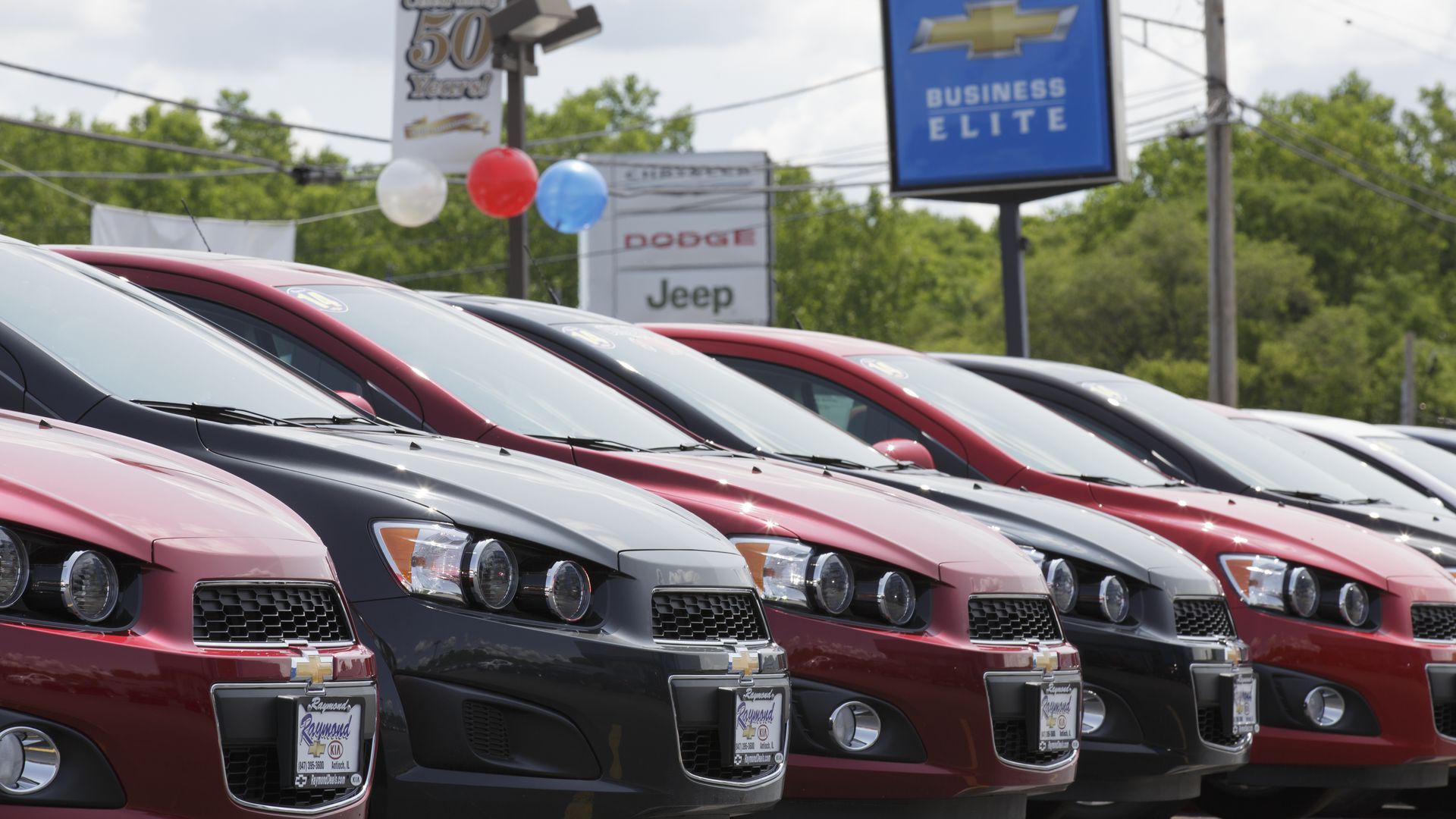 Image of cars lined up at Chevrolet dealership