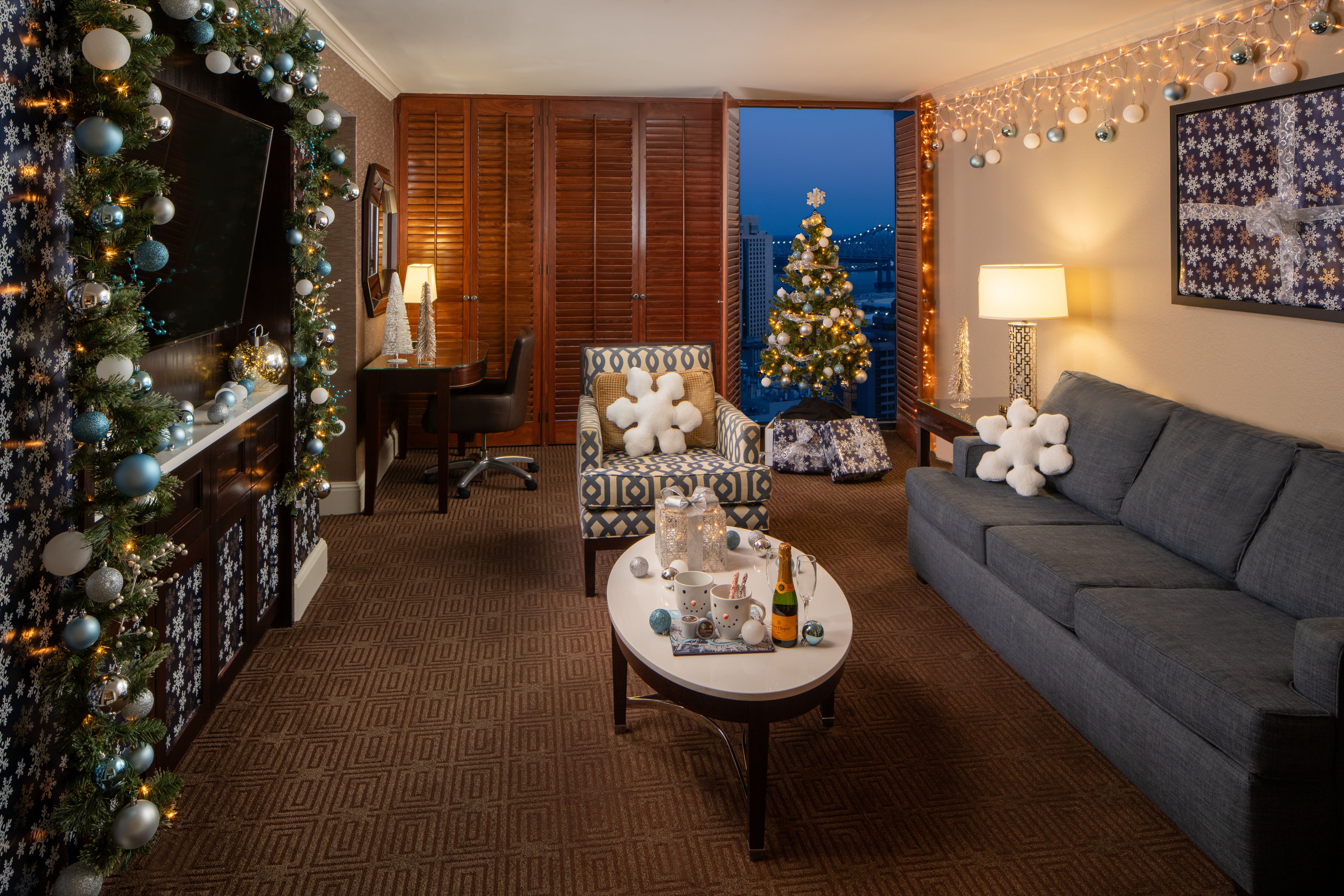 A hotel room that's been decorated for Christmas.