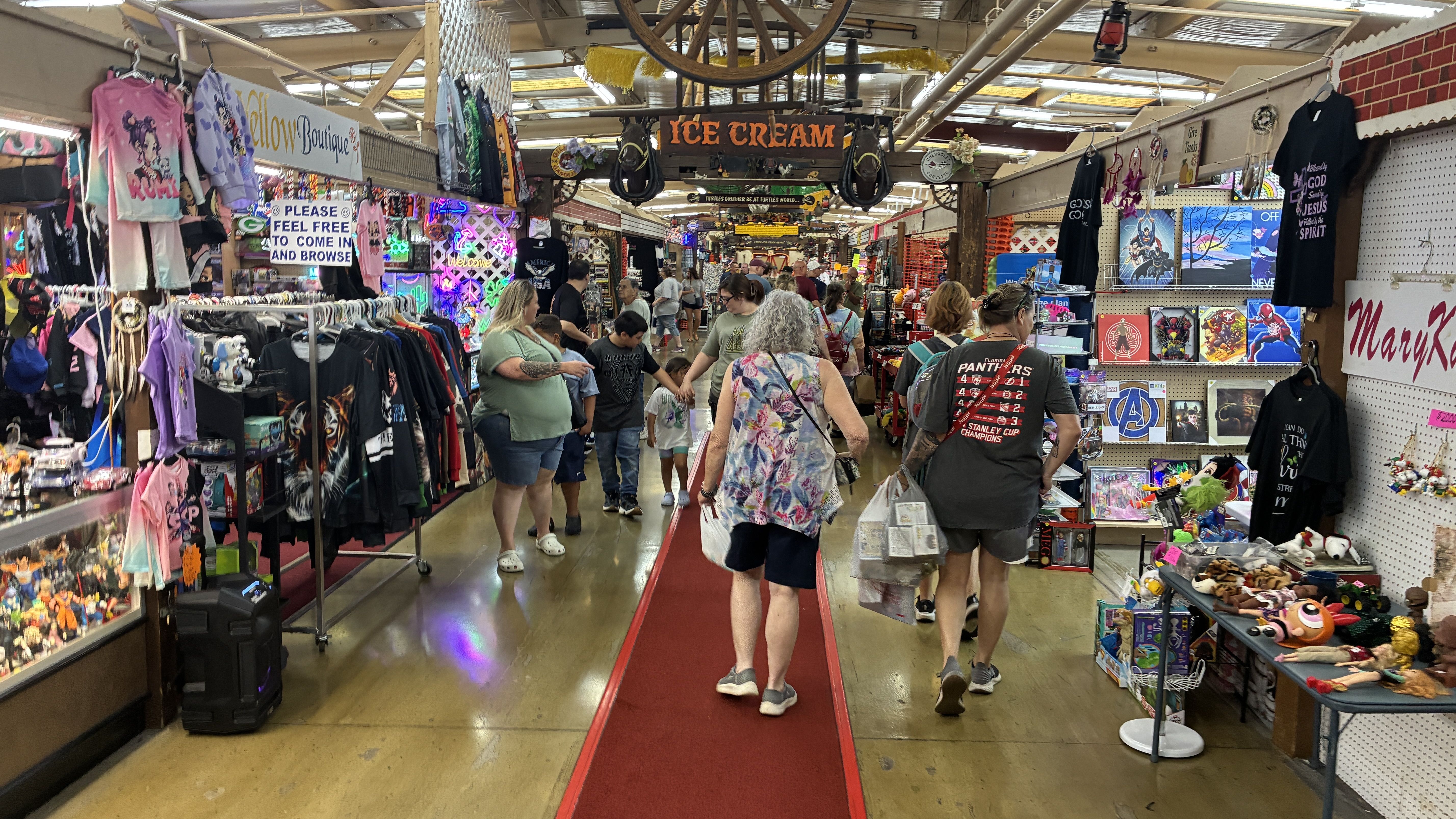 Shoppers wander through one of the buildings at Traders World.