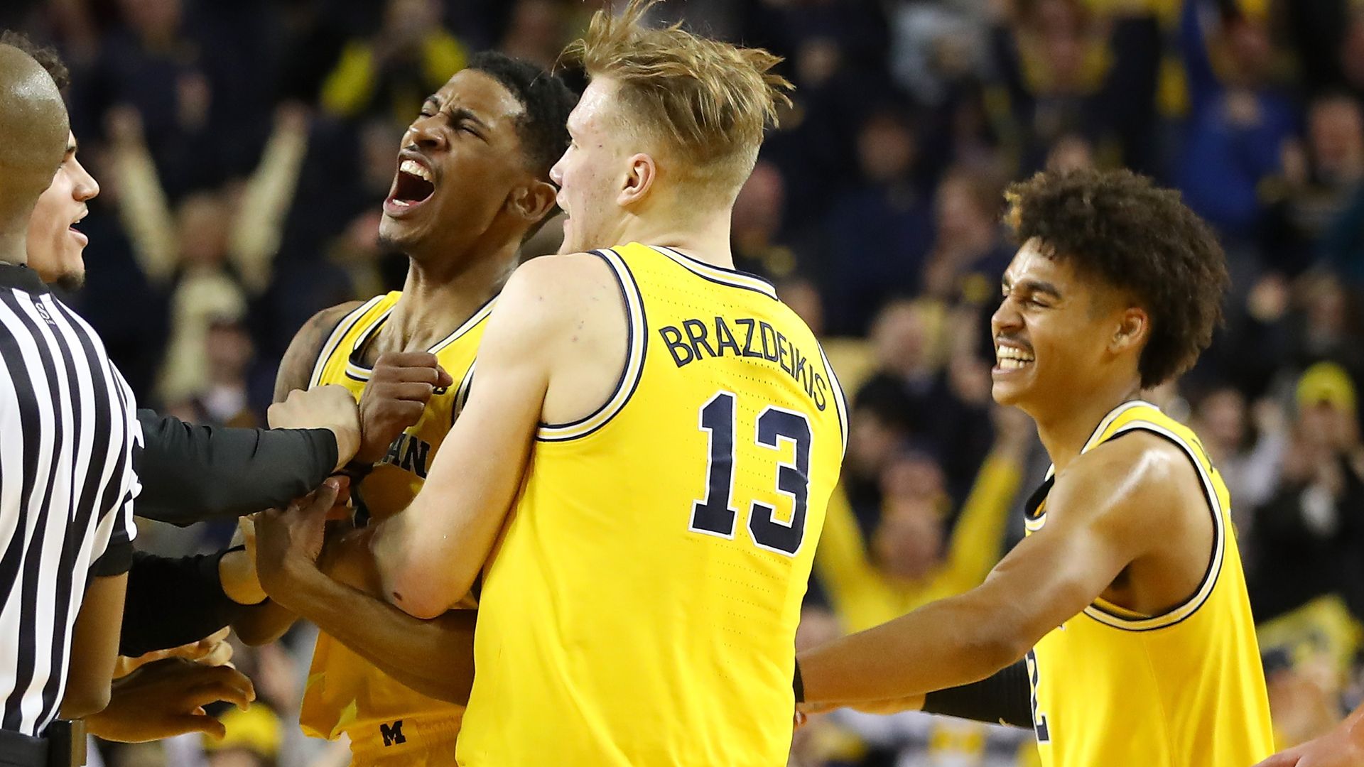 Charles Matthews celebrates after his buzzer-beater