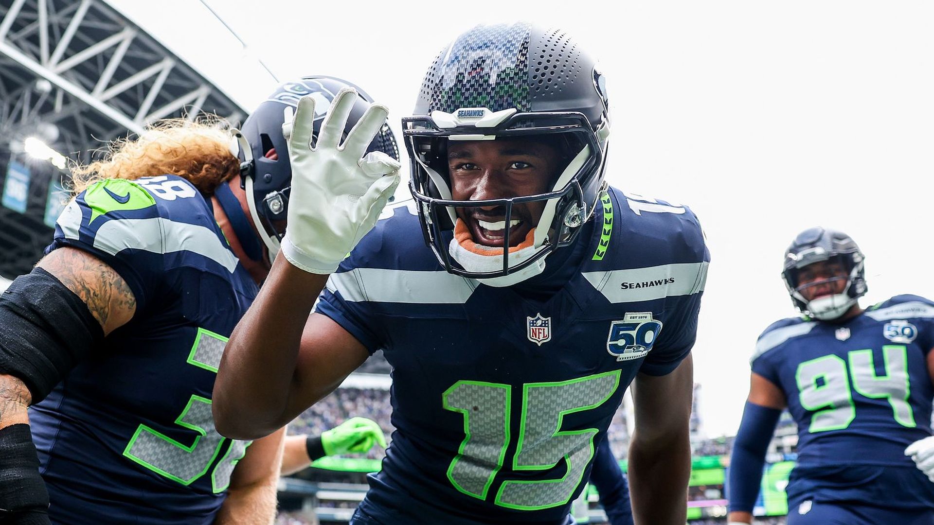 Tory Horton #15 of the Seahawks flashes "ok" to the camera after a  touchdown.