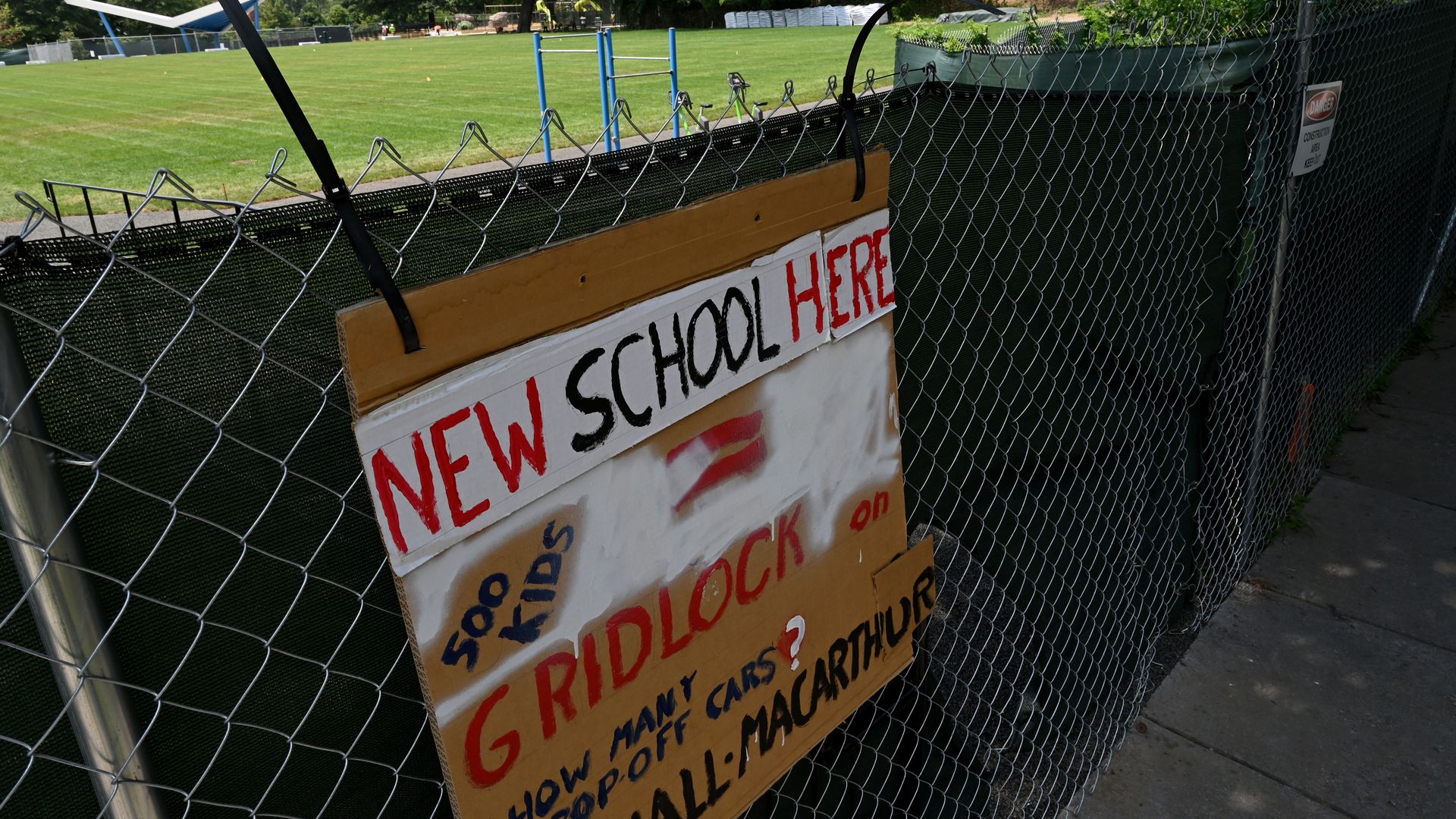 A sign opposing a new school at Hardy Park