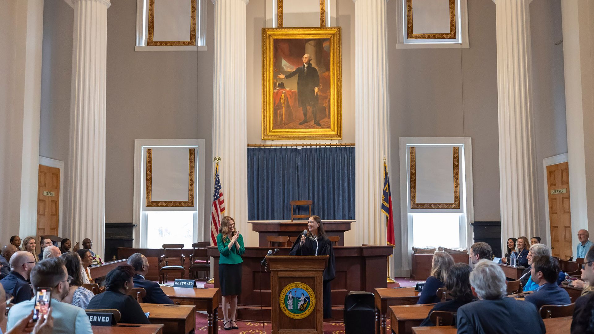 North Carolina Supreme Court Justice Anita Earls introduces Justice Allison Riggs, before administering the oath of office for the North Carolina Supreme Court, in the House Chamber of the State Capitol on Tuesday, May 13, 2025, in Raleigh, North Carolina. (Robert Willett/The News & Observer/Tribune