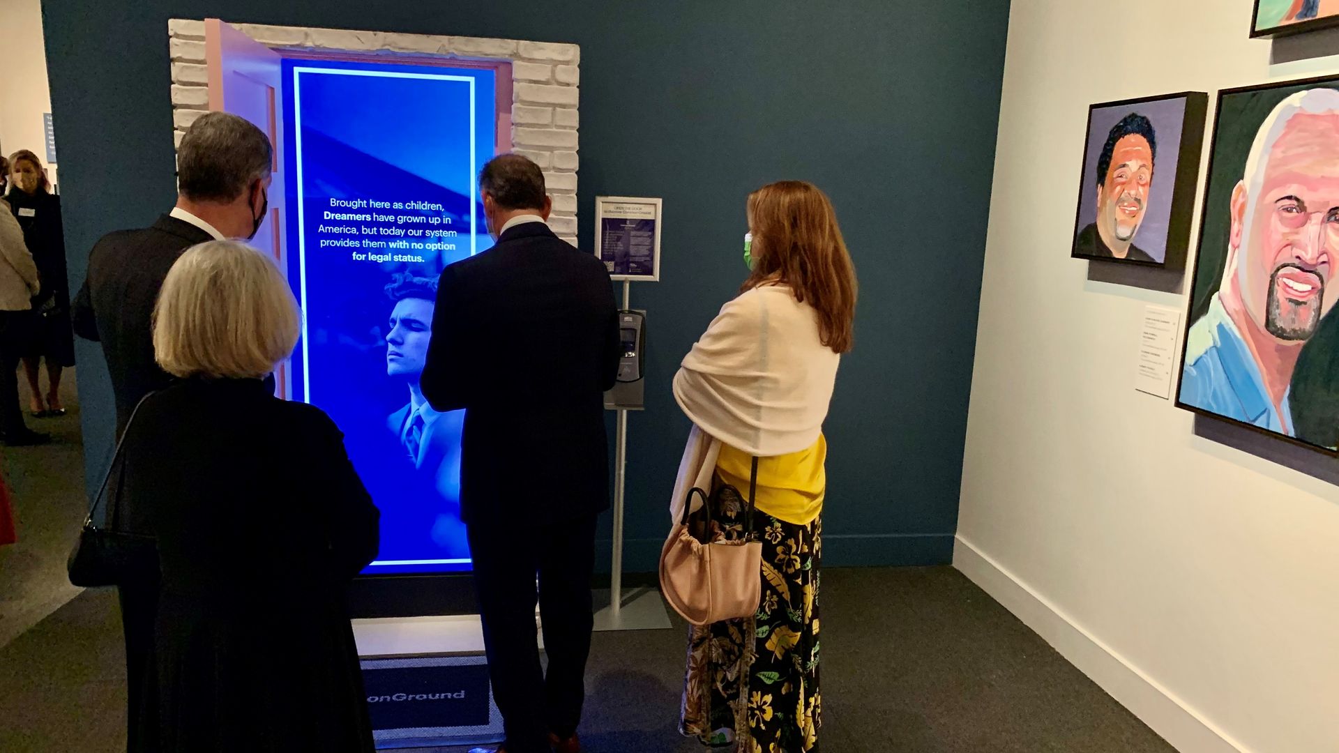 Visitors view an immigration exhibiti at the George W. Bush Presidential Center in Dallas.