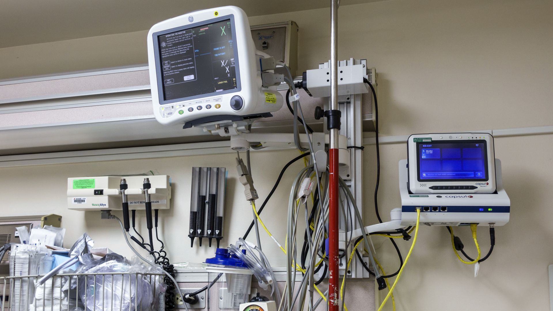 Medical equipment and monitors in a hospital emergency room.