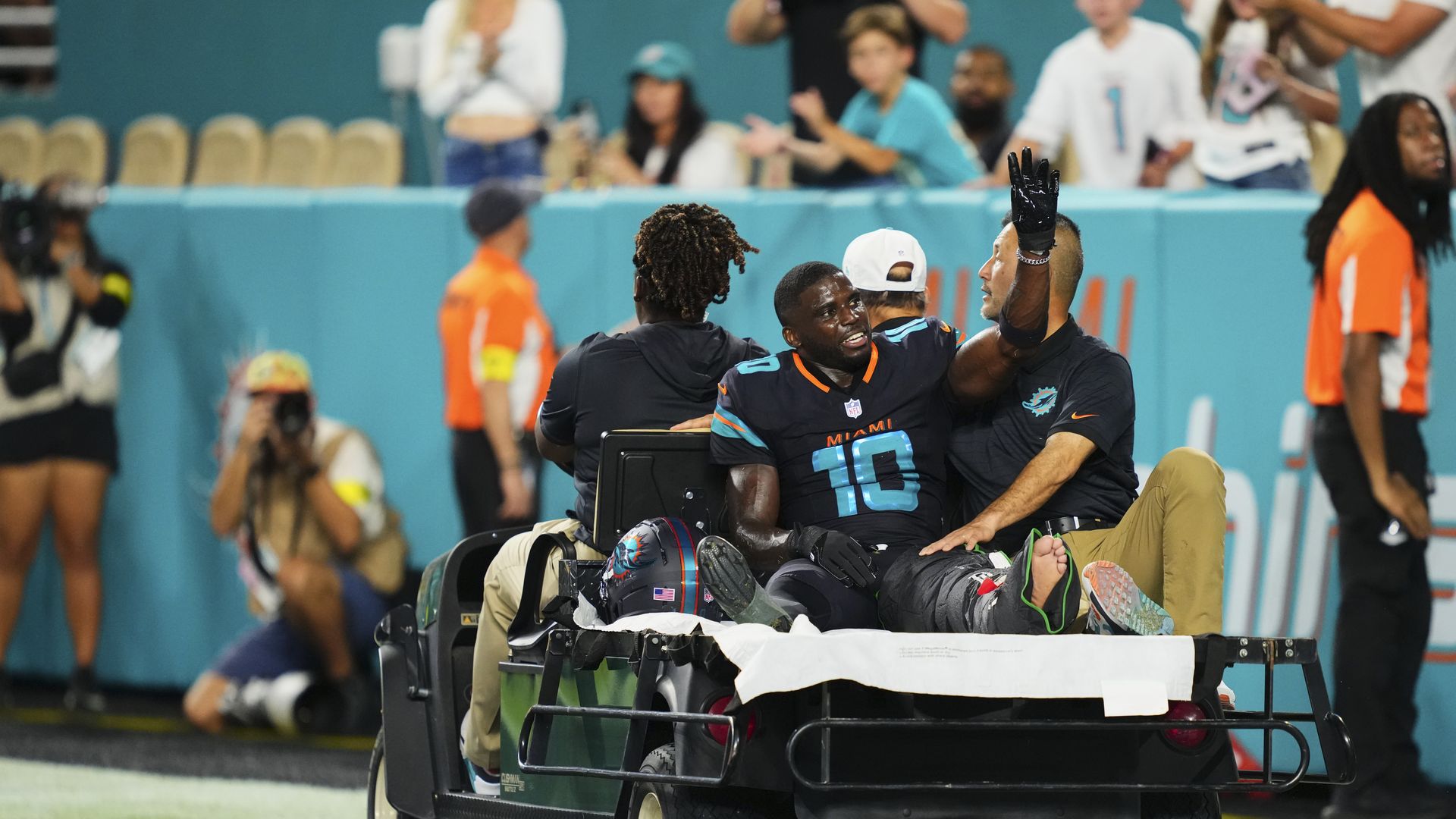 MIAMI GARDENS, FL - SEPTEMBER 29: Tyreek Hill#10 of the Miami Dolphins is carted off the field after suffering an injury against the New York Jets during an NFL football game at Hard Rock Stadium on September 29, 2025 in Miami Gardens, Florida. (Photo by Cooper Neill/Getty Images)
