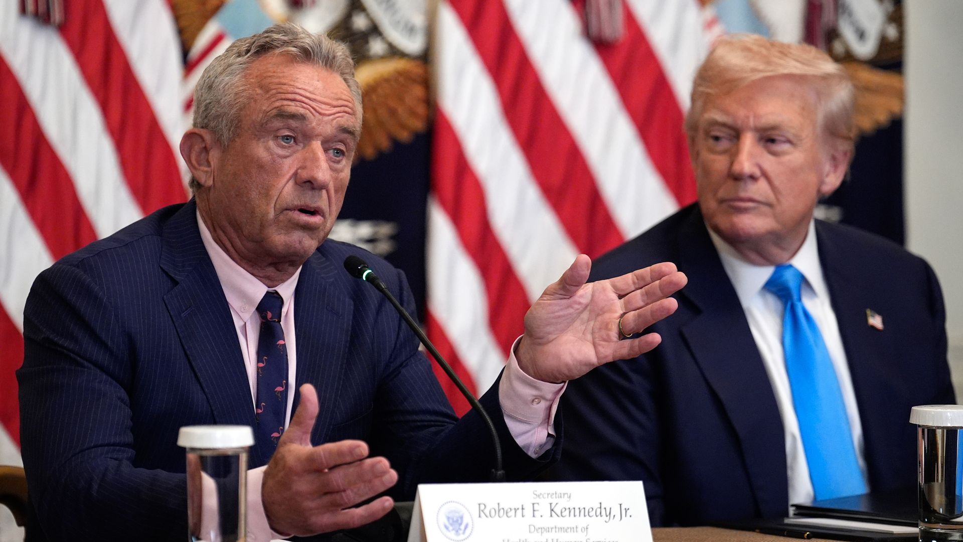 Trump and Robert F. Kennedy at a White House event in July