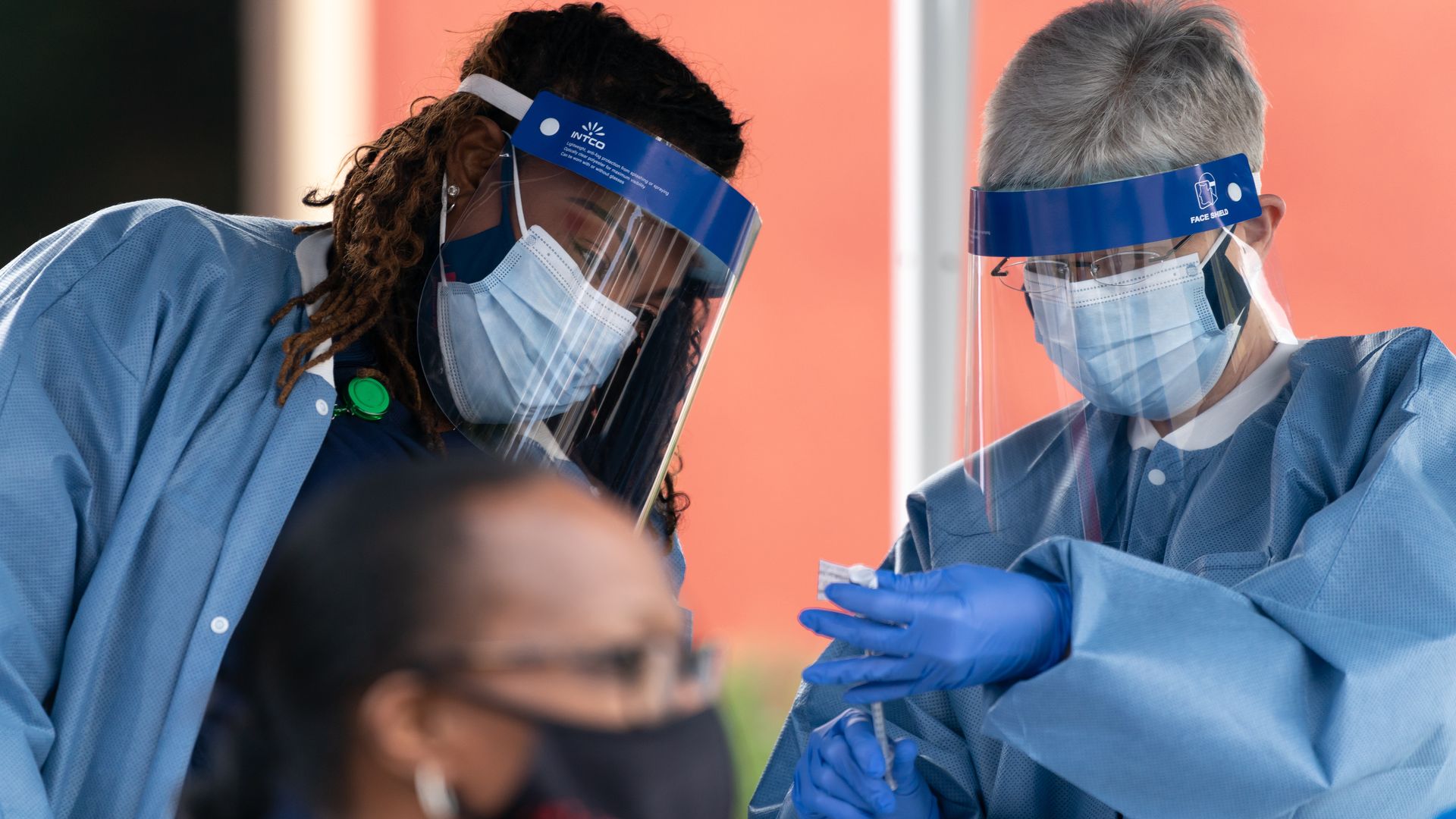 Nurses preparing a dose of coronavirus vaccine in Savannah, Georgia, in December 2020.