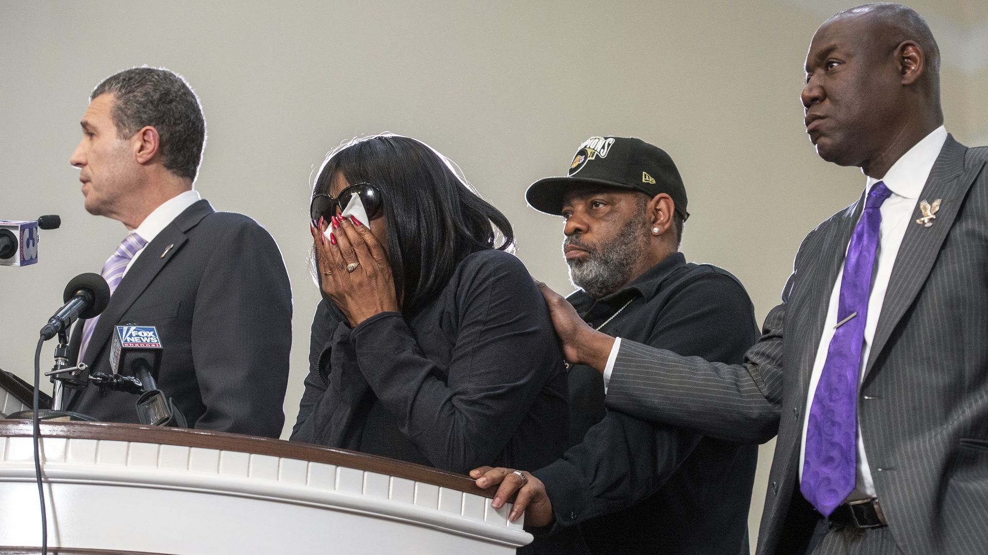 Tyre Nichols' mother, RowVaugn Wells, and stepfather, Rodney Wells, flanked by attorneys Ben Crump (right) and Antonio Romanucci (left) in a Memphis church on Jan. 23.