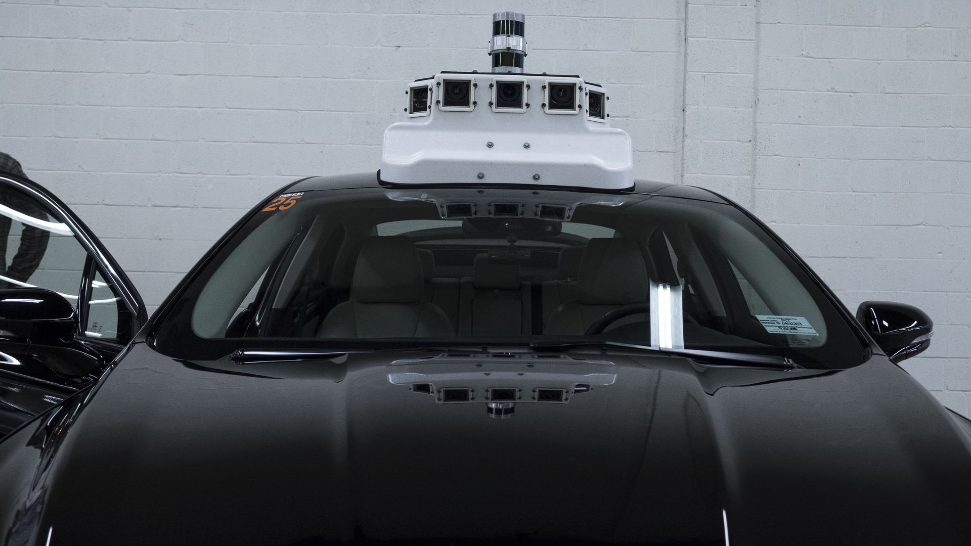 a black autonomous Ford sedan