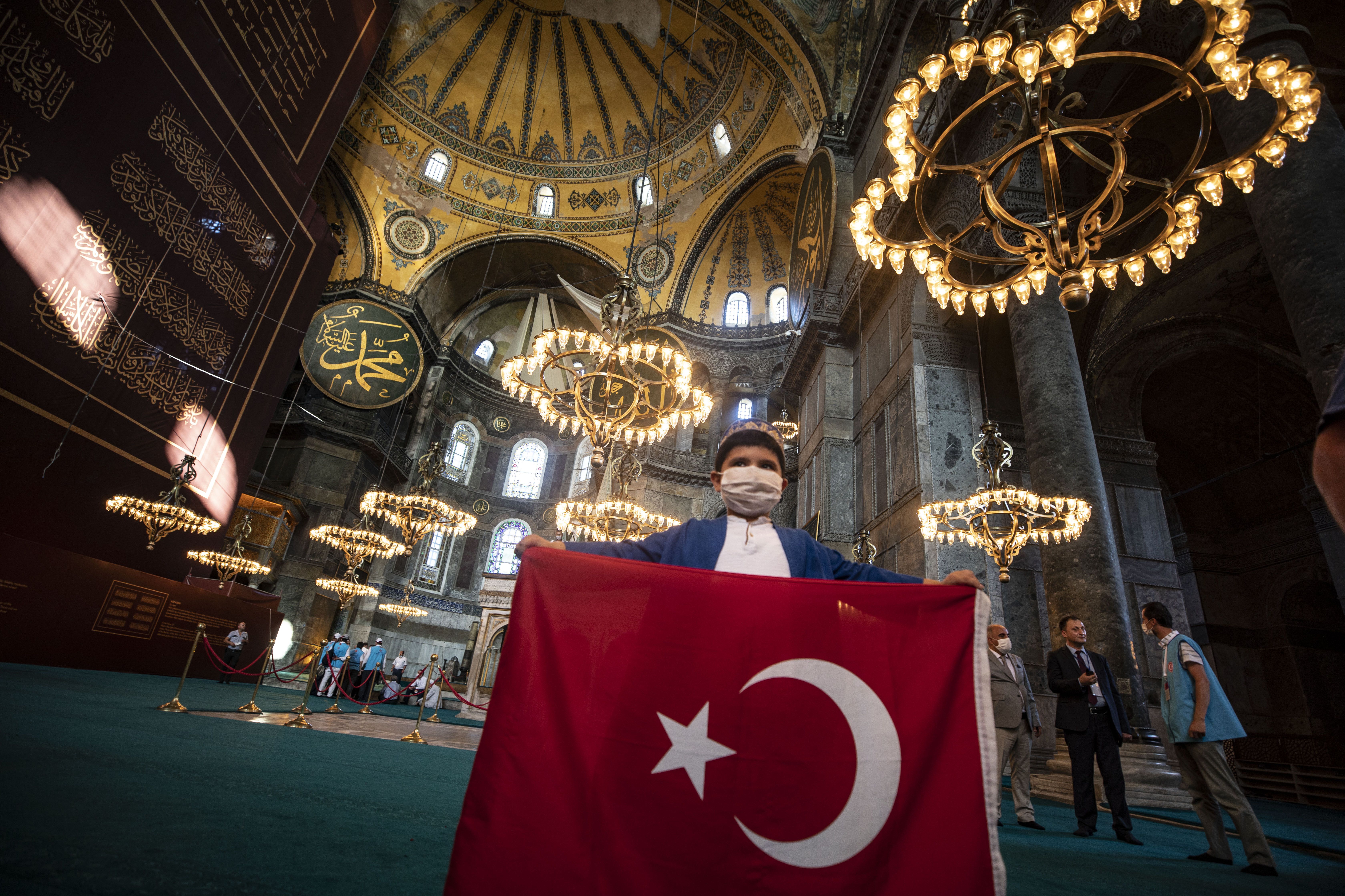 A child holding a Turkish flag inside Hagia Sophia on July 24.
