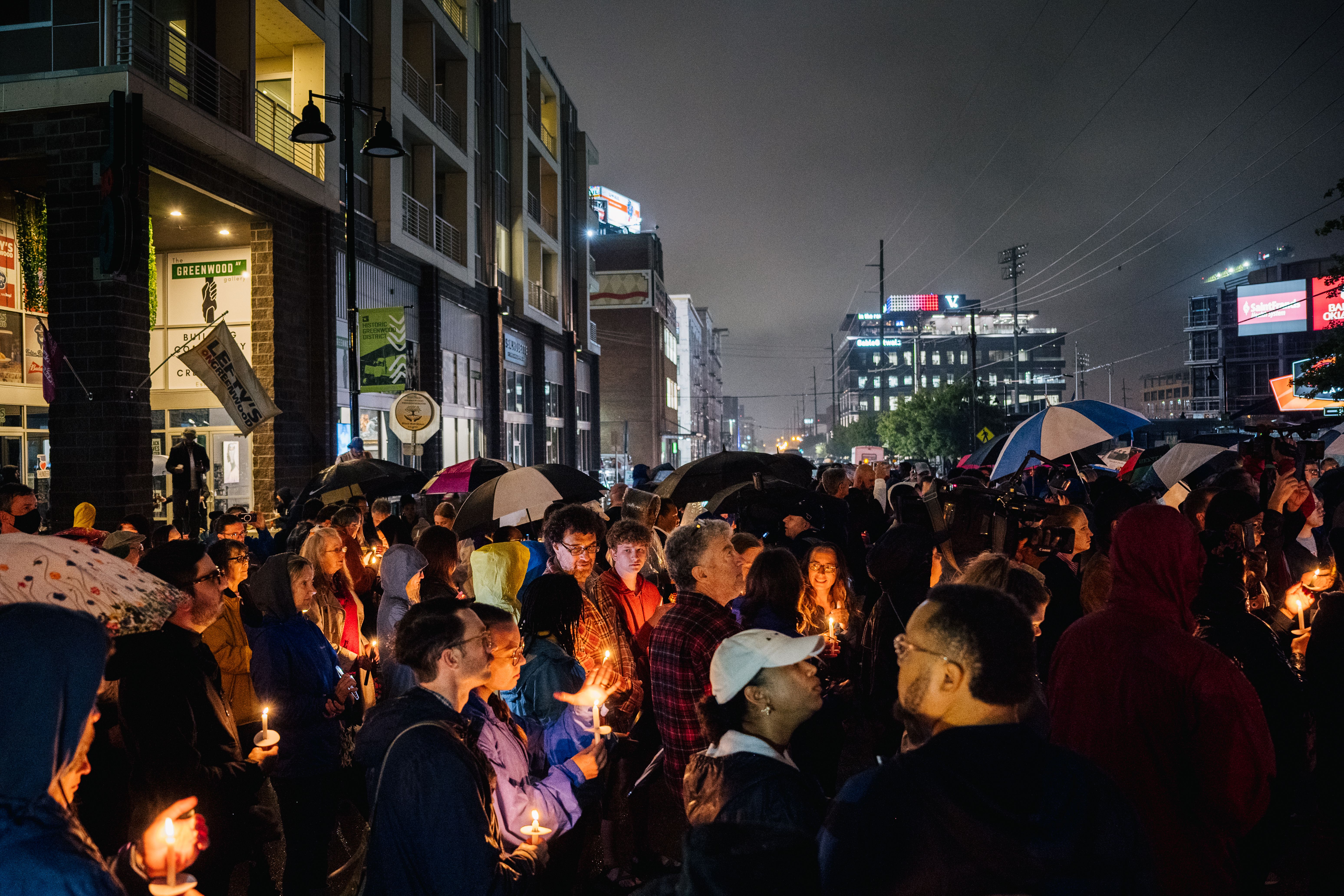 People partake in a candlelight vigil in the Greenwood district during commemorations of the 100th anniversary of the Tulsa Race Massacre on May 31, 2021 in Tulsa, Oklahoma. 
