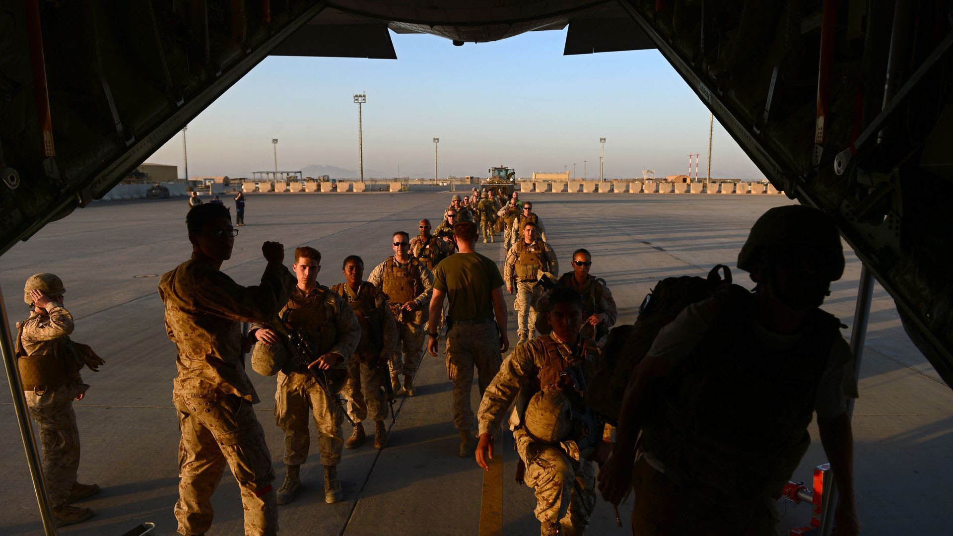 U.S. troops at Camp Leatherneck in Helmand, in two line formation