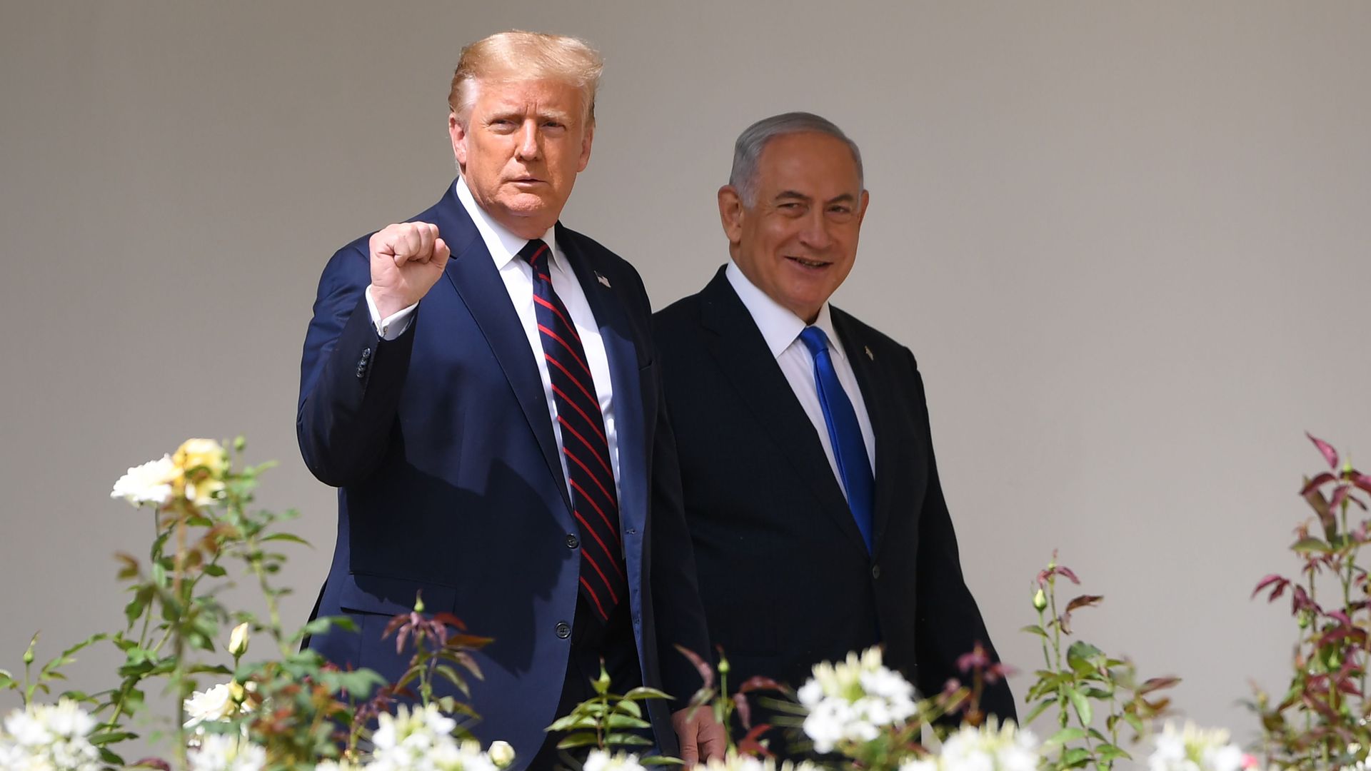 President Trump and Israel Prime Minister Benjamin Netanyahu walk at the White House. 