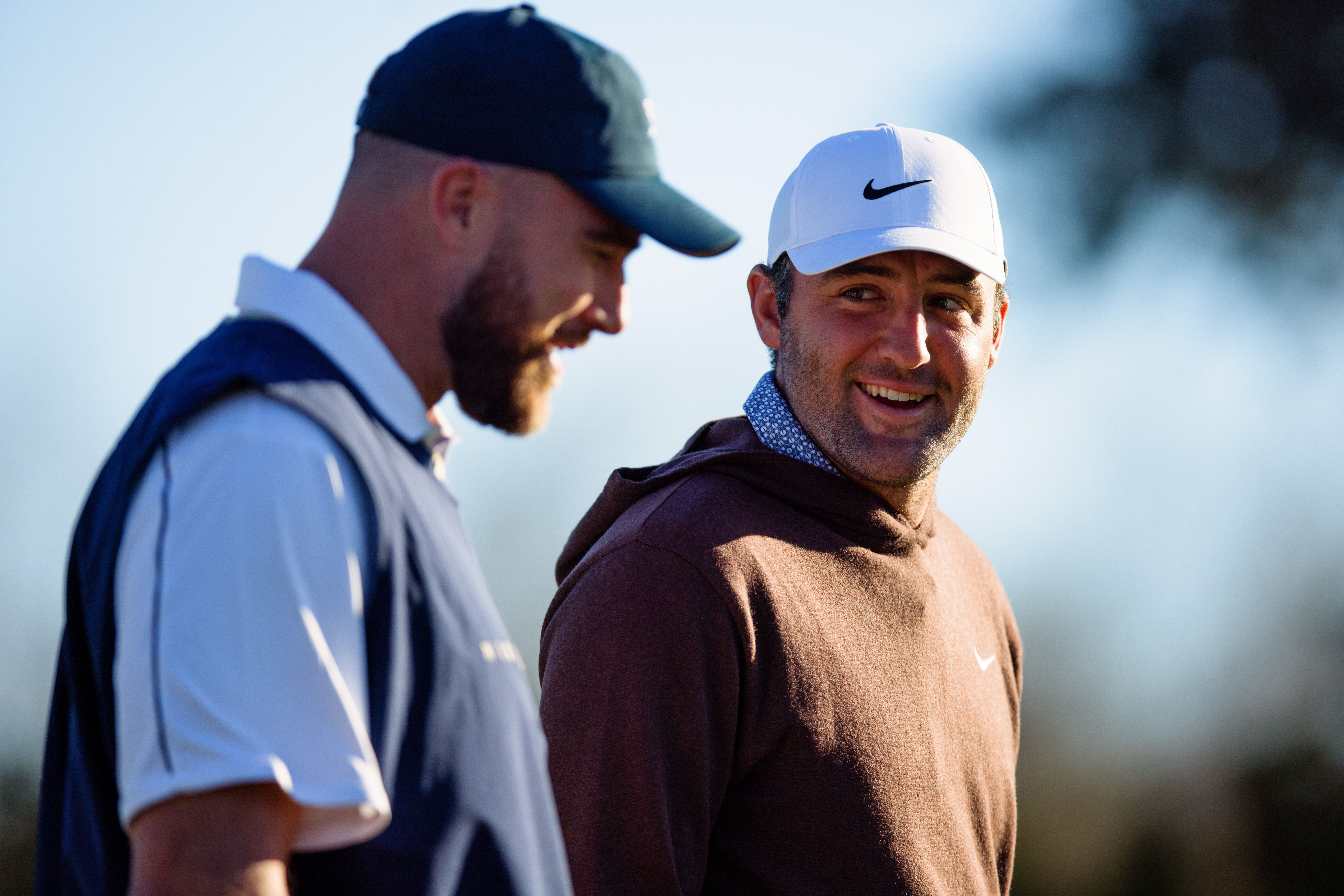 Travis Kelce with PGA golfer Scottie Scheffler.