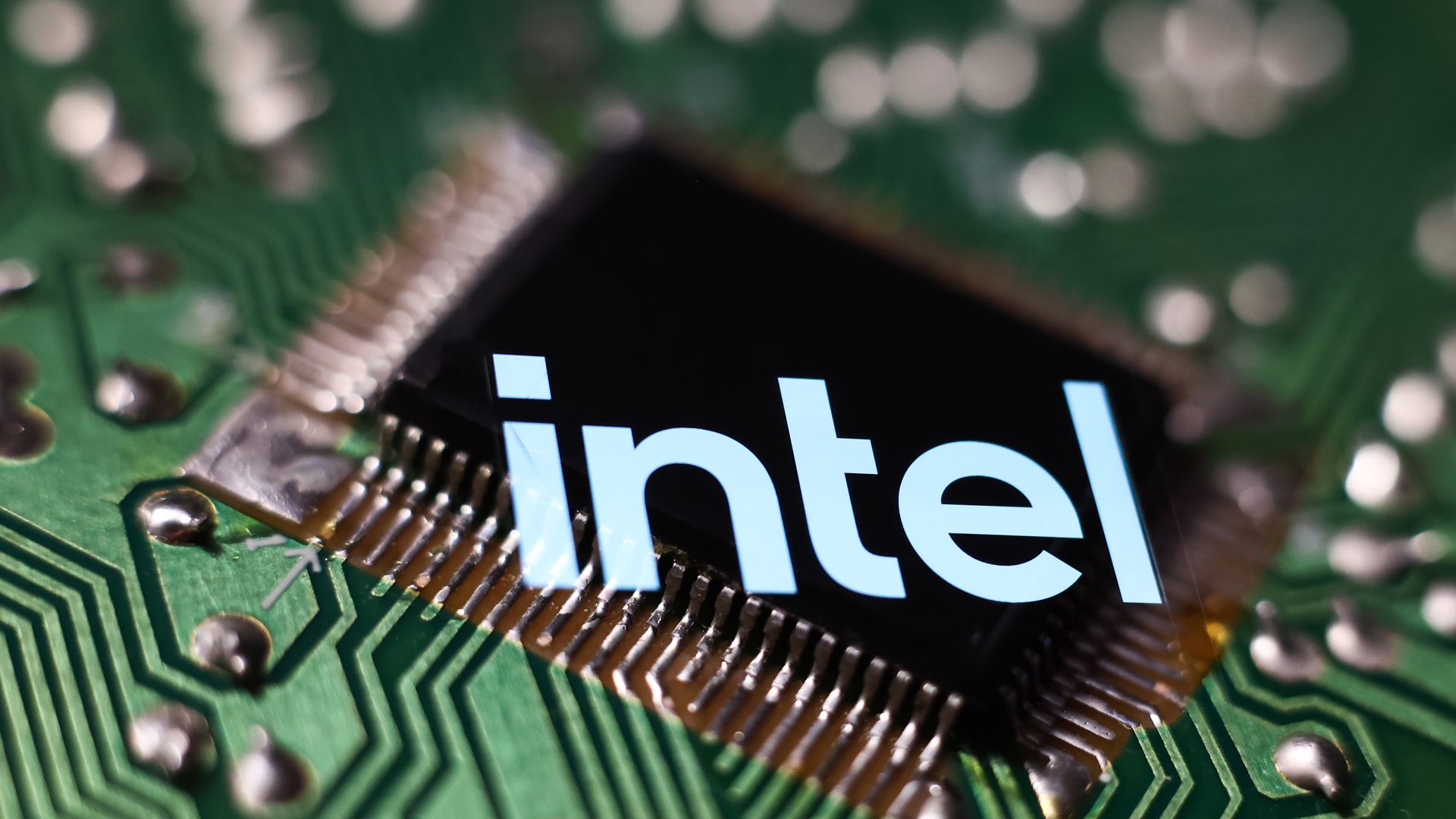 A chip with an Intel logo above it.