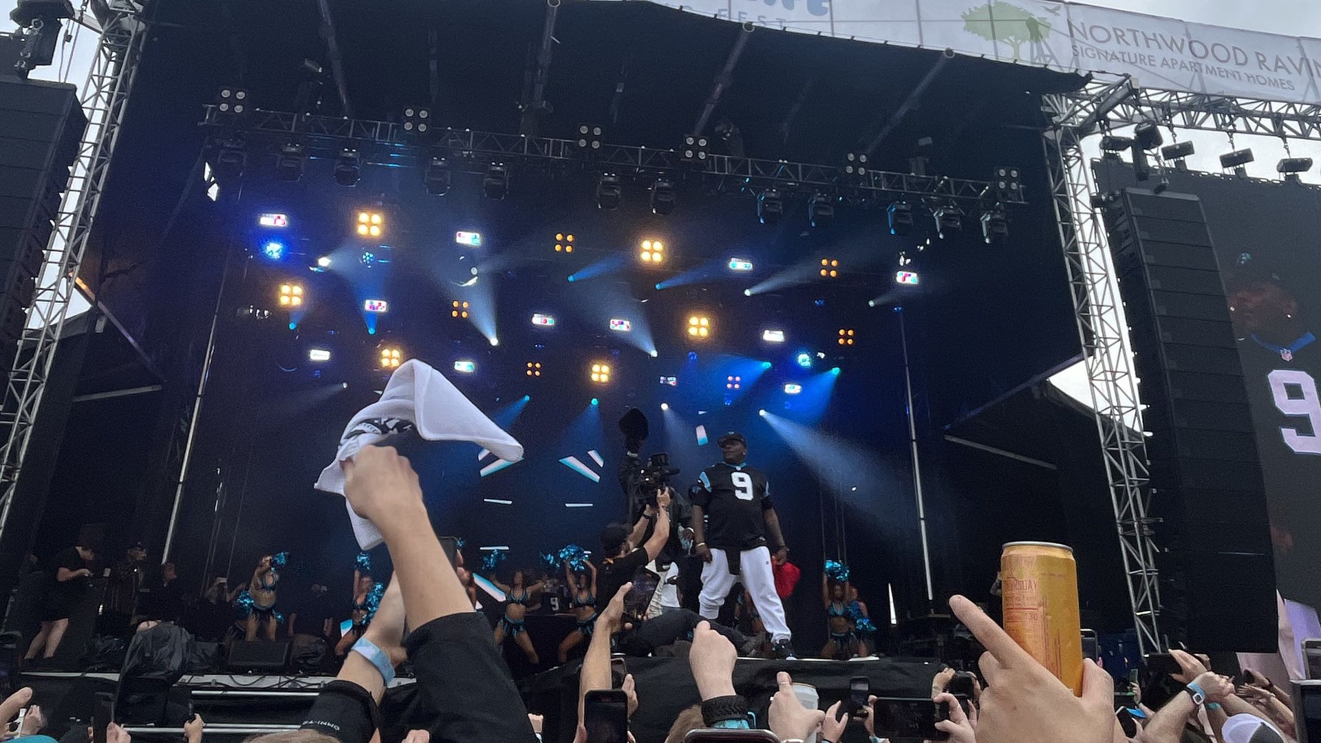 Petey Pablo on stage at an outdoor concert