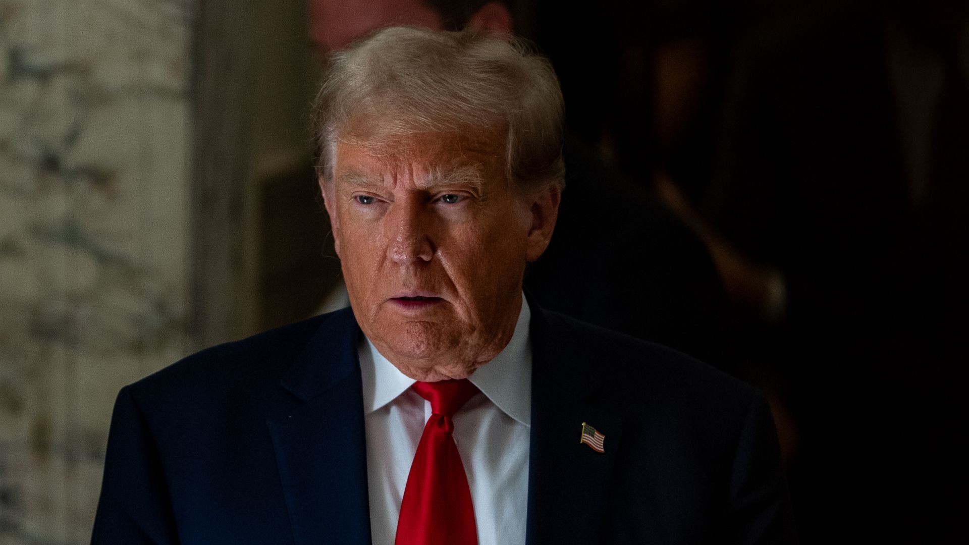 Former President Donald Trump steps out of court during an afternoon break on the third day of his civil fraud trial at New York State Supreme Court on October 04, 2023 in New York City