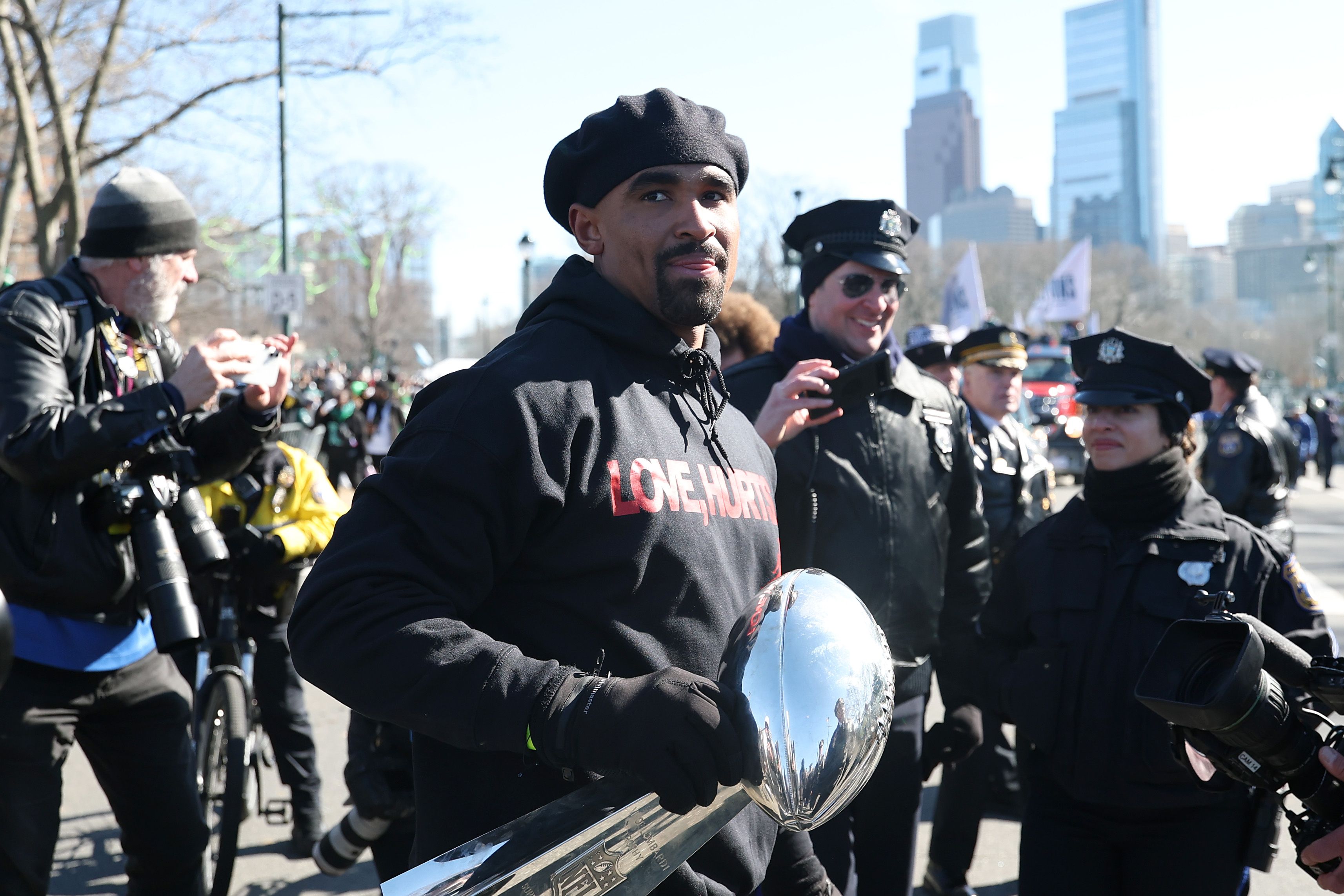 Eagles QB Jalen Hurts holds the Lombardi Trophy.