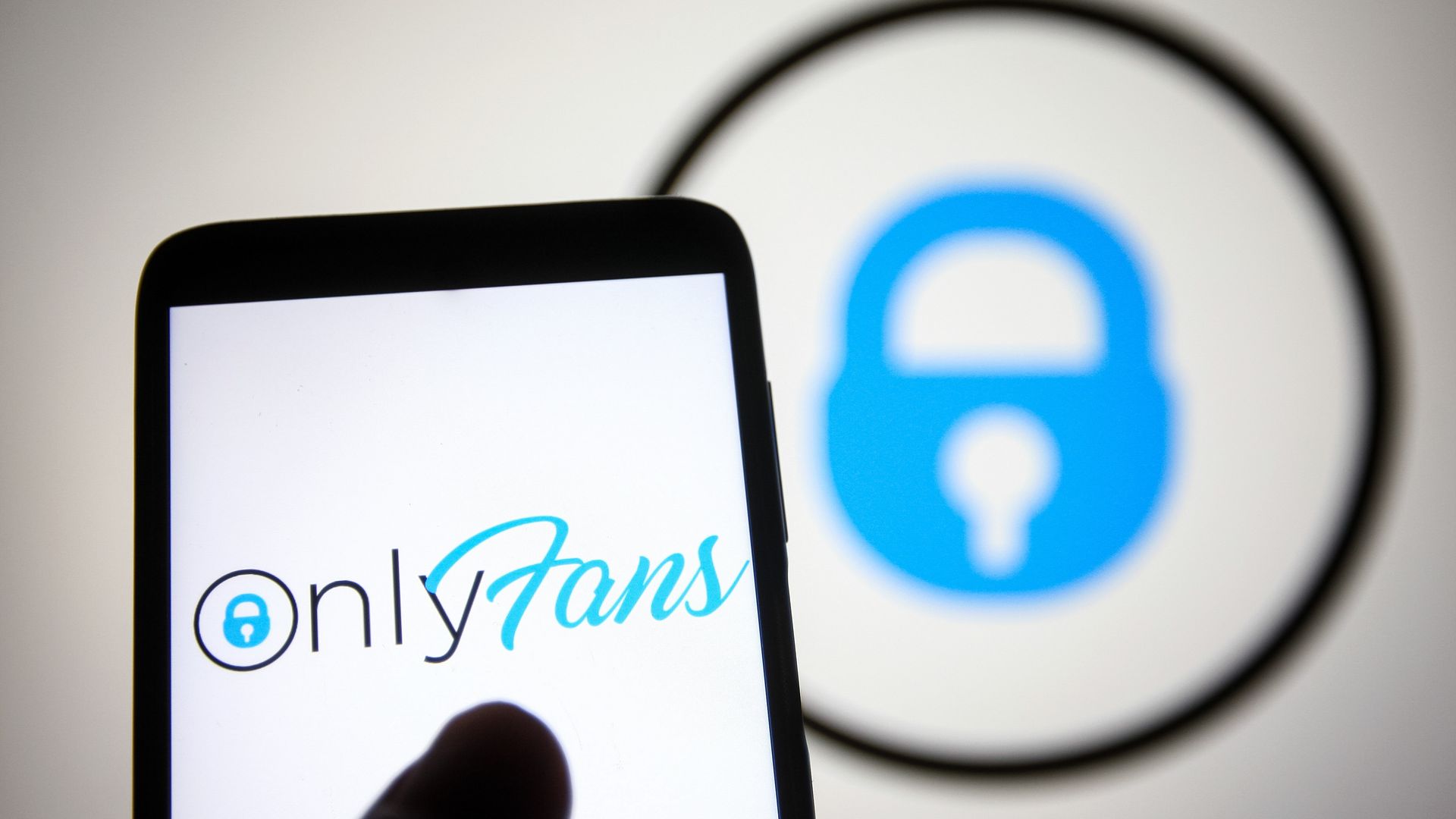 In this photo illustration, OnlyFans logo of a content subscription service is seen displayed on a smartphone