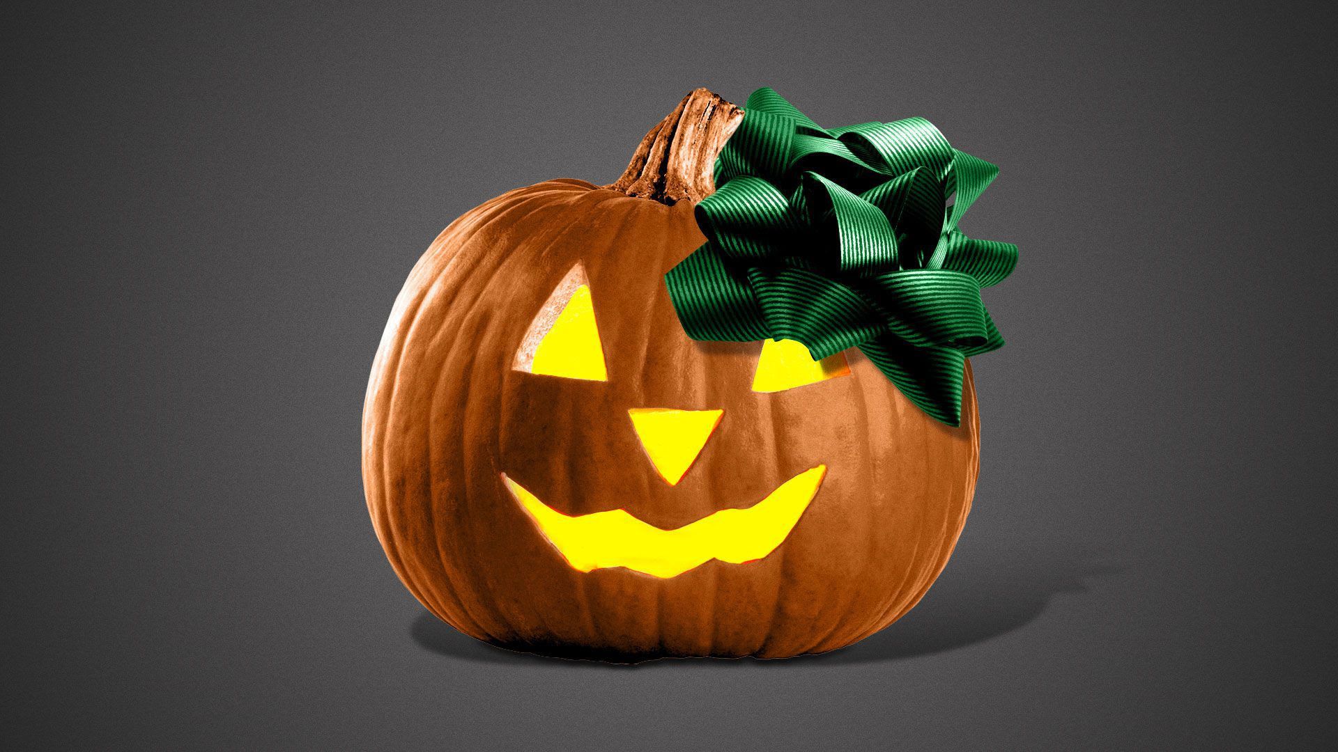 a jacholantern with a bow on it