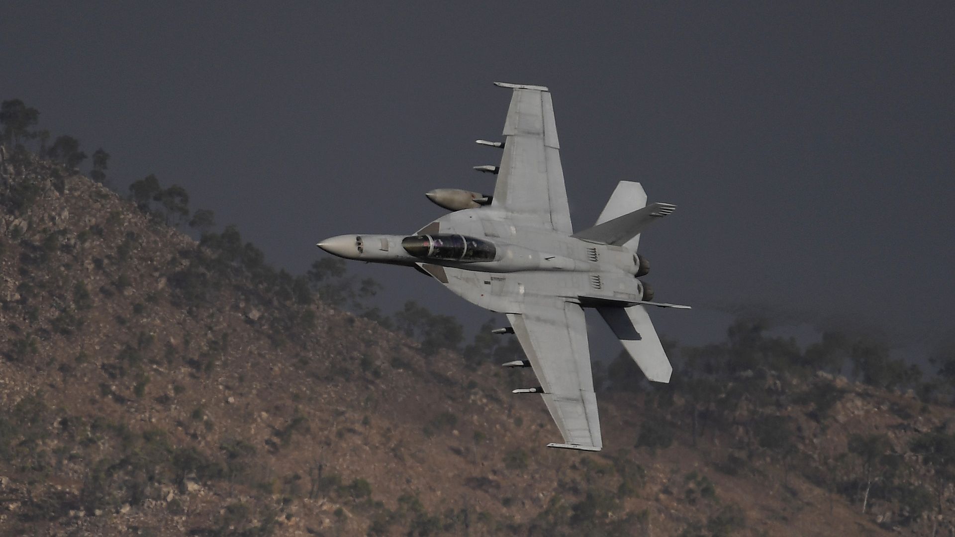 A RAAF (Royal Australian Air Force) F/A-18F Super Hornet conducts a 'show of force' as part of Exercise Nigrum Pugio on October 14, 2020 in Townsville, Australia.