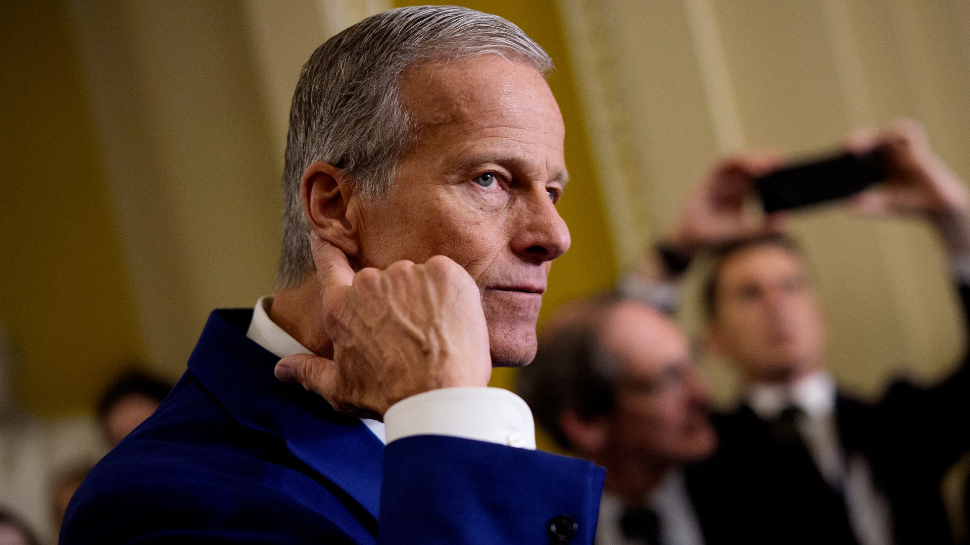 Senate Majority Leader John Thune takes a question from a reporter at the U.S. Capitol on Oct. 15, 2025.