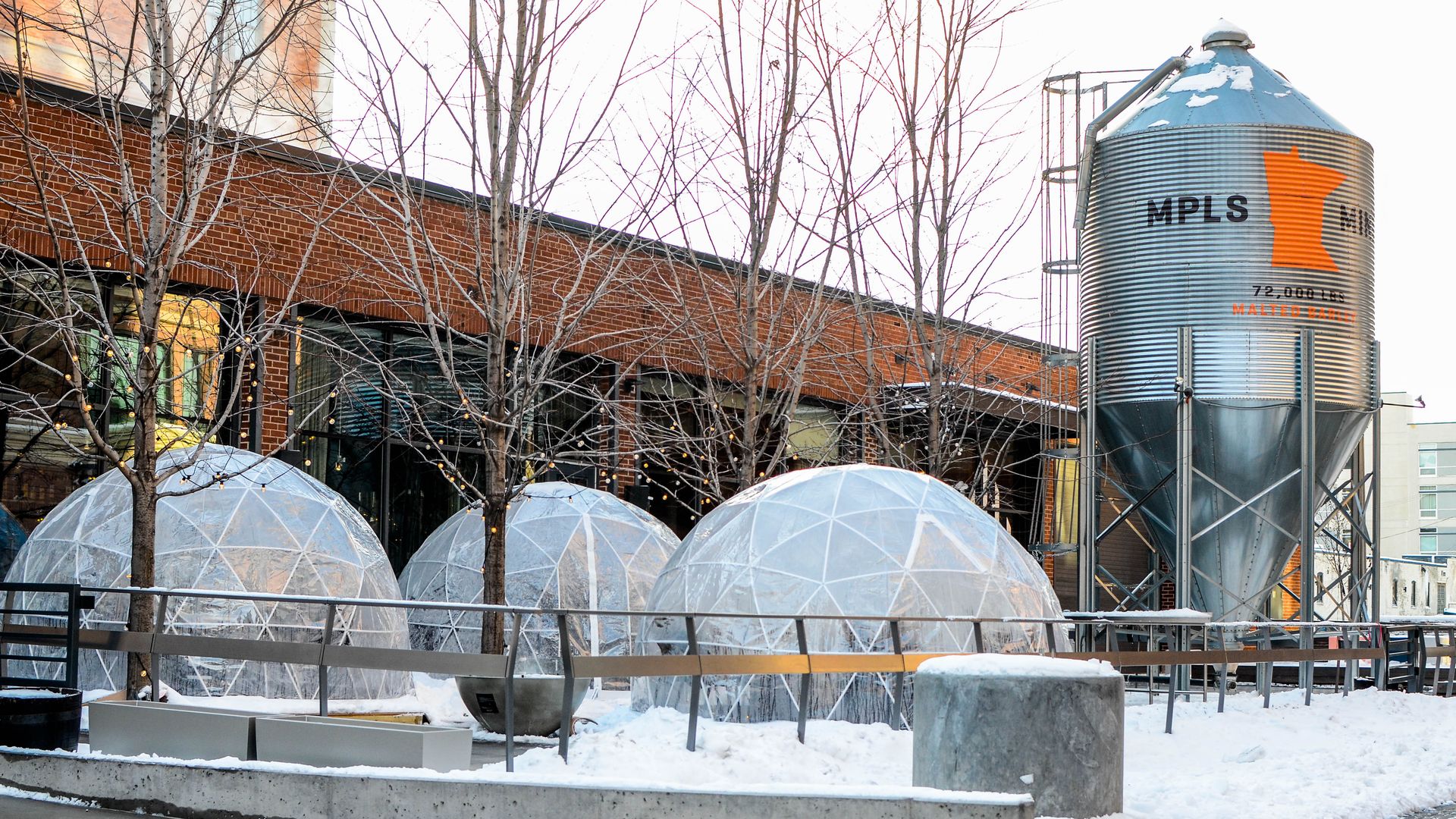 large clear domes on restaurant patio 