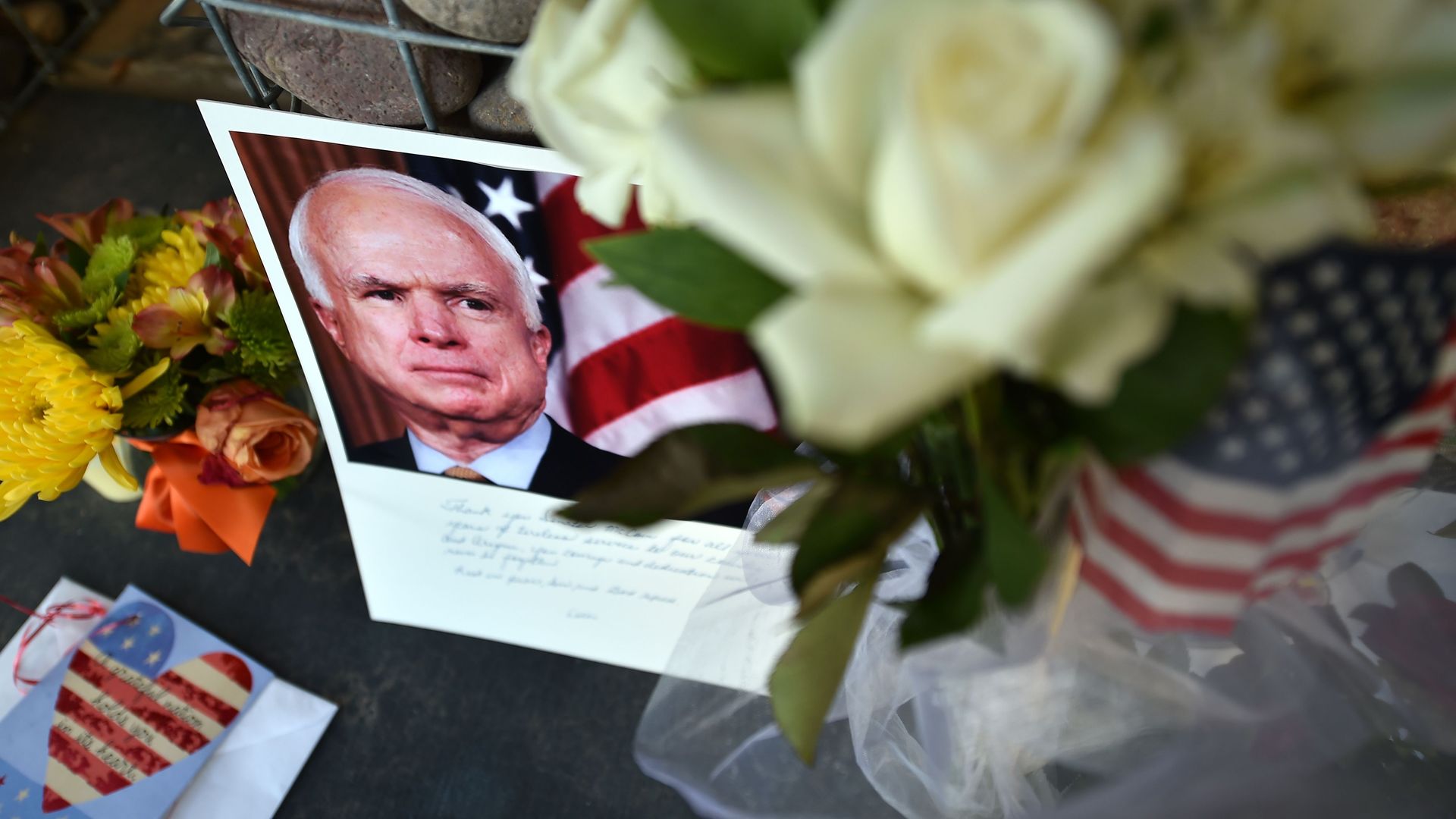 A makeshift memorial for Sen. John McCain outside his office in Phoenix, Arizona. Photo: Robyn Beck/AFP/Getty Images
