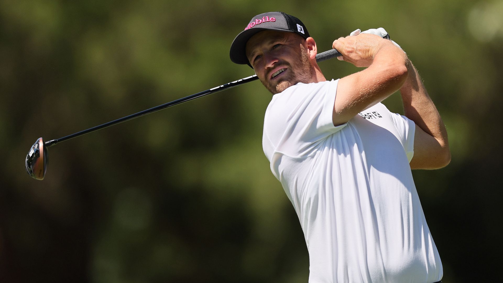 Wyndham Clark of the United States plays his shot from the seventh tee during the third round of the FedEx St. Jude Championship at TPC Southwind on August 17, 2024 in Memphis, Tennessee. 