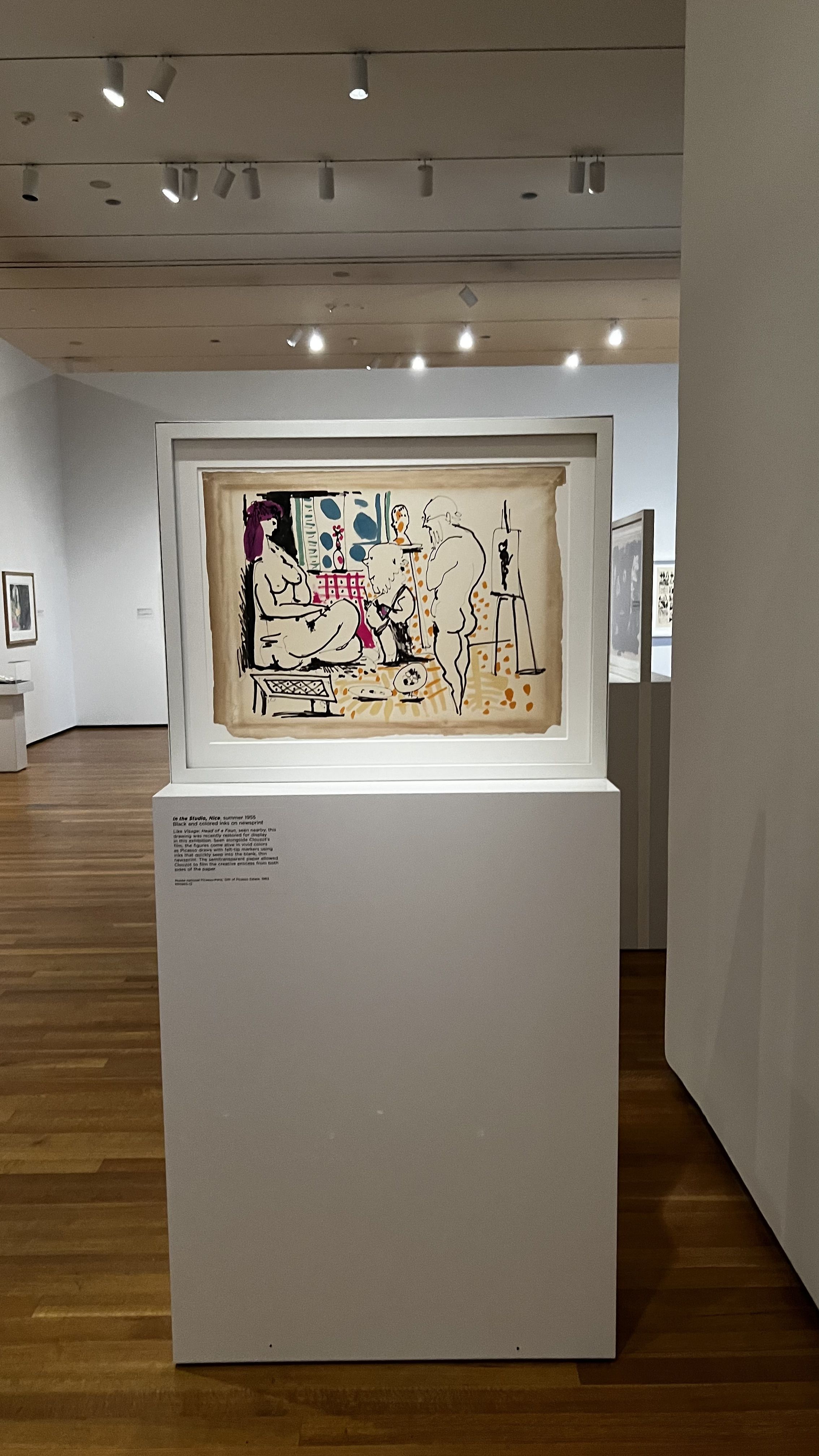 A colorful painting of two nude people. 