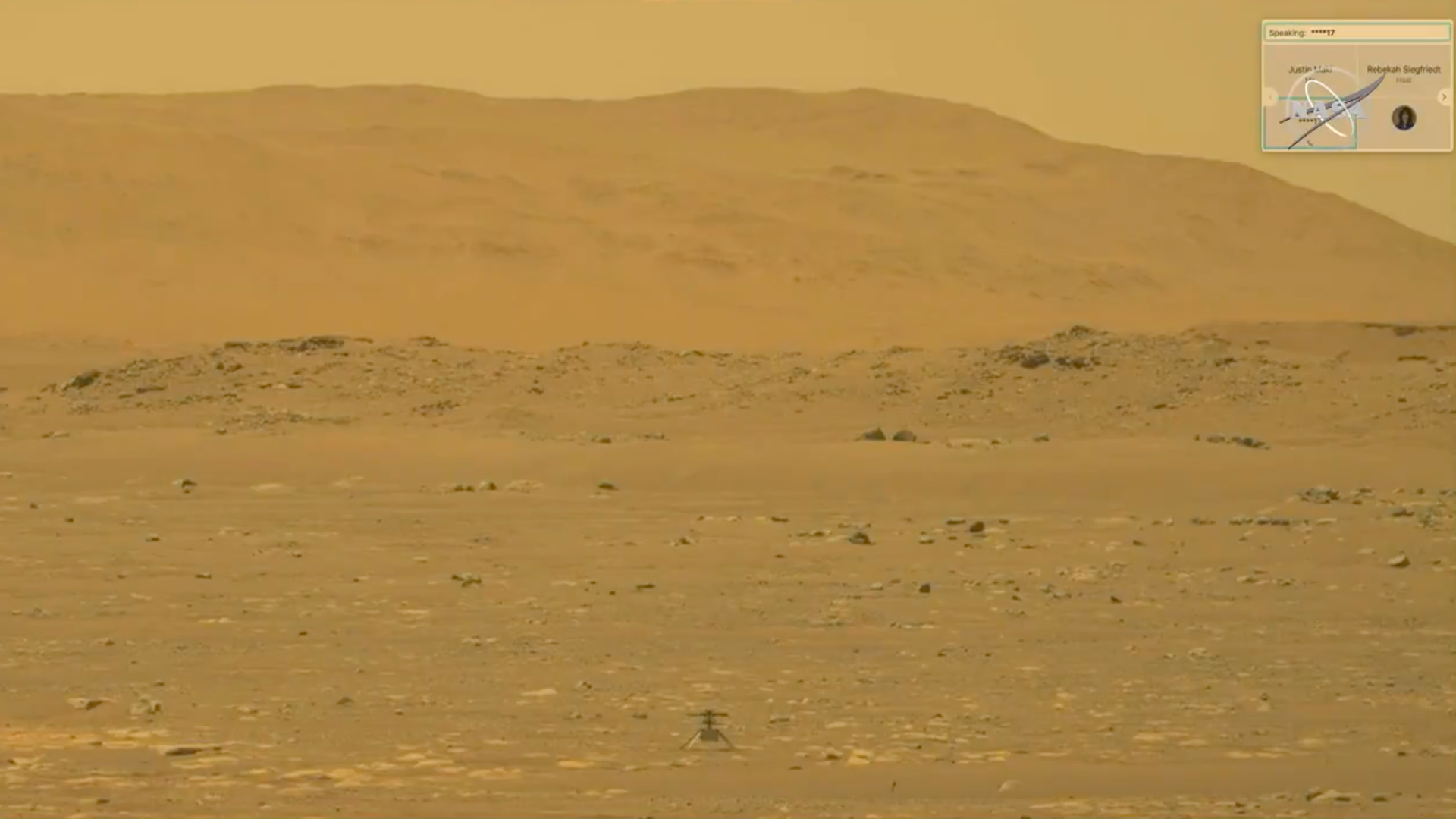 Ingenuity sits on the surface of Mars.