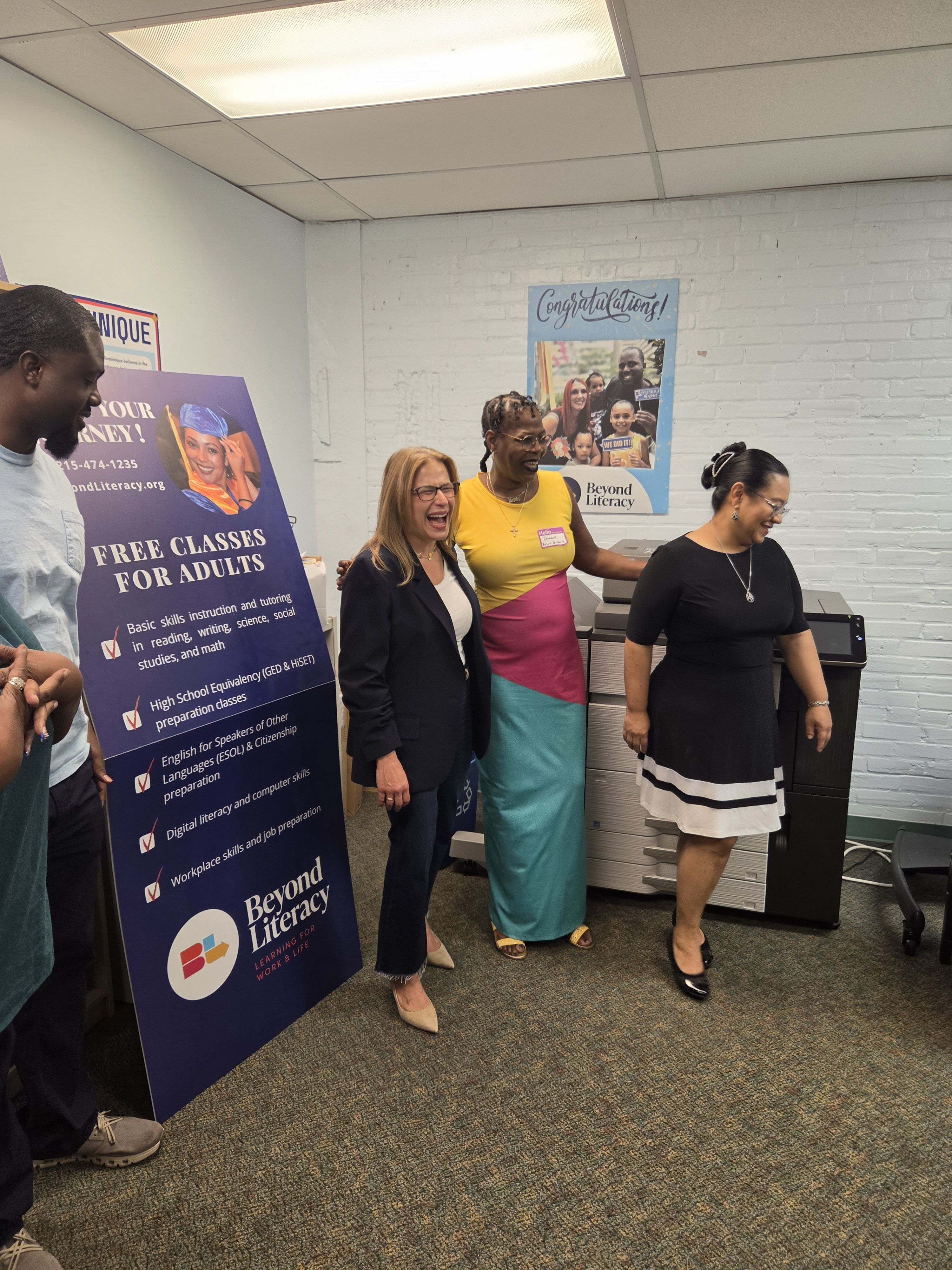 Dorrie Miller-Abdul-Rahim standing with first lady Lori Shapiro inside Beyond Litearcy's headquarters.