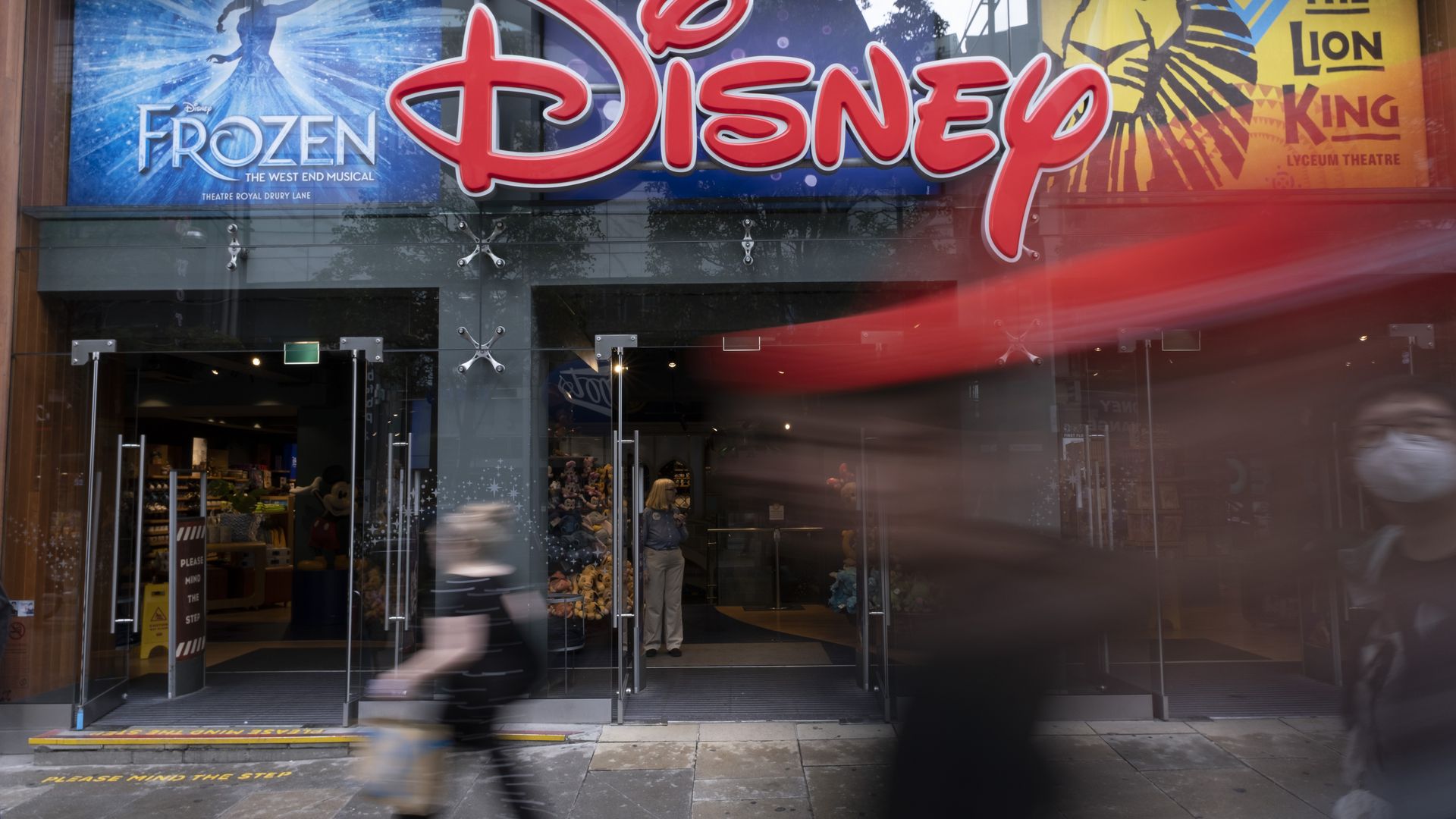 Photo of the Disney storefront across the street from pedestrians