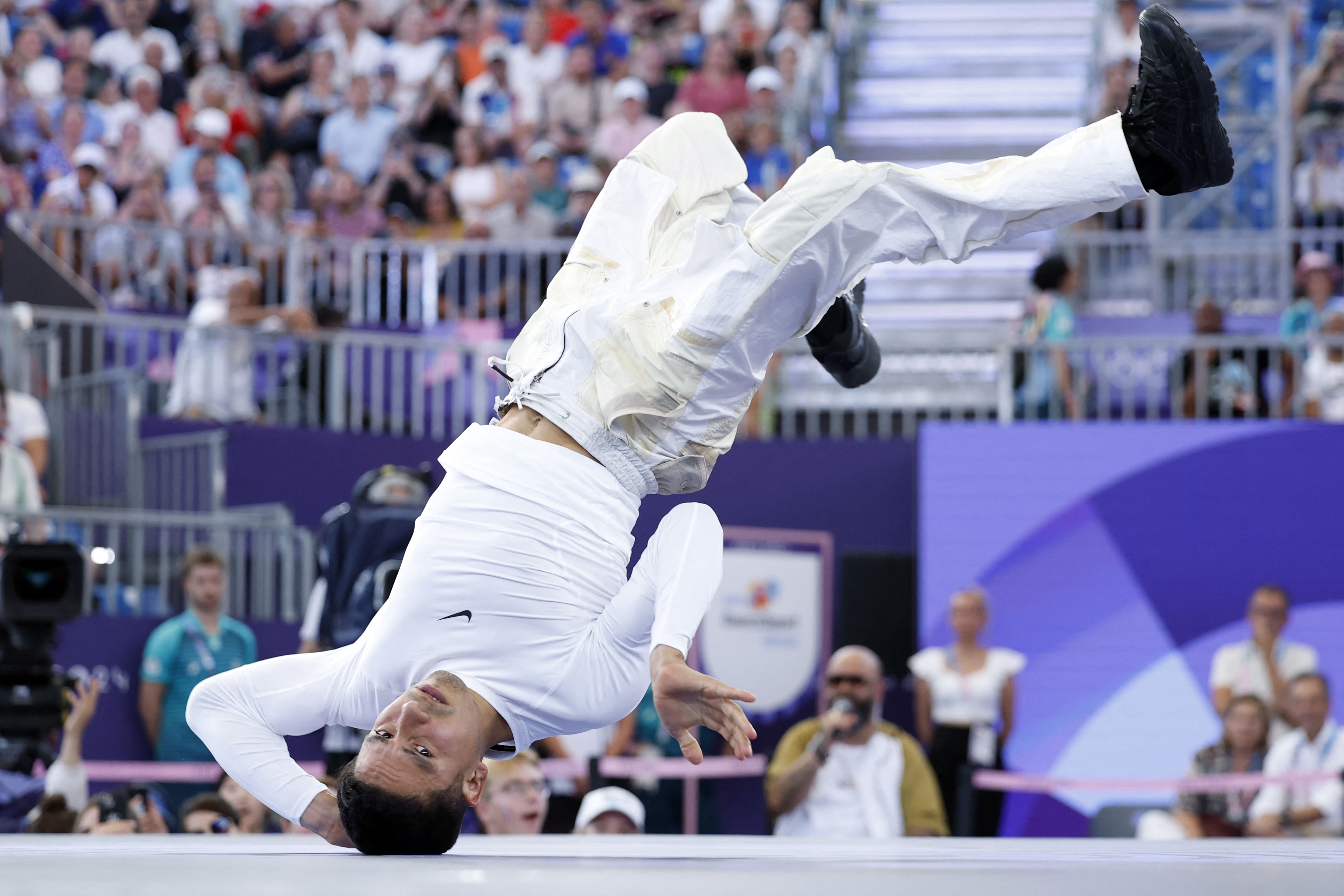 US' Victor Montalvo known as Victor competes in the Men's Breaking dance quarter-final of the Paris 2024 Olympic Games at La Concorde in Paris, on August 10, 2024. (Photo by Odd ANDERSEN / AFP